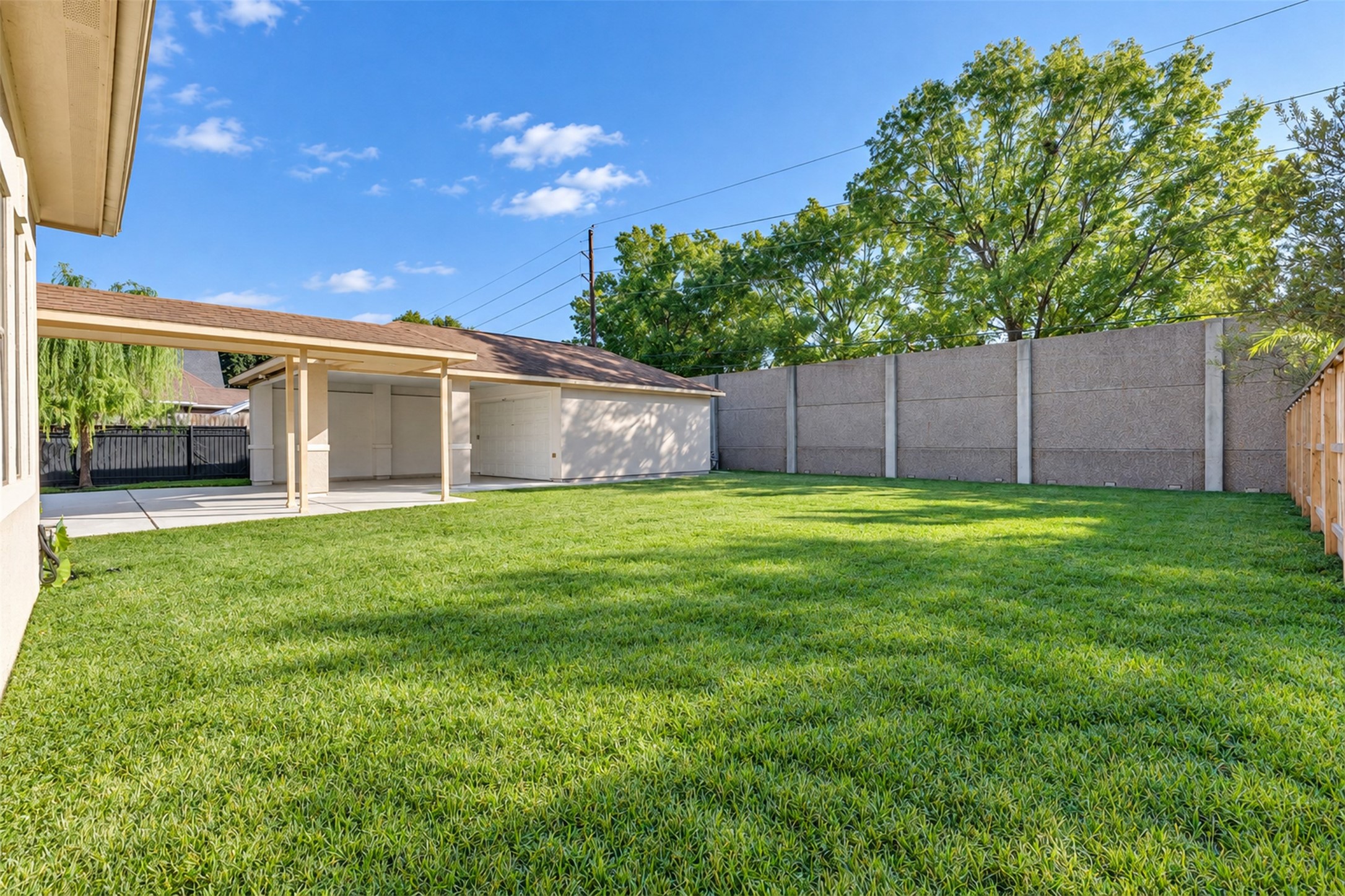 Backyard: A generously sized backyard offers space for outdoor seating, gardening, and entertaining.