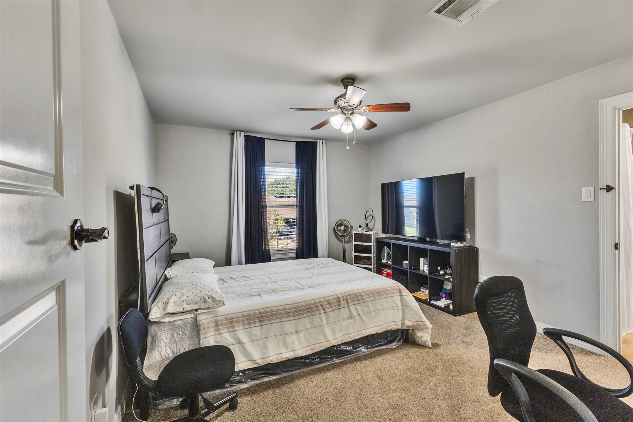 Four spacious bedrooms offer comfort and flexibility, with room for guests, hobbies, or a peaceful personal retreat.