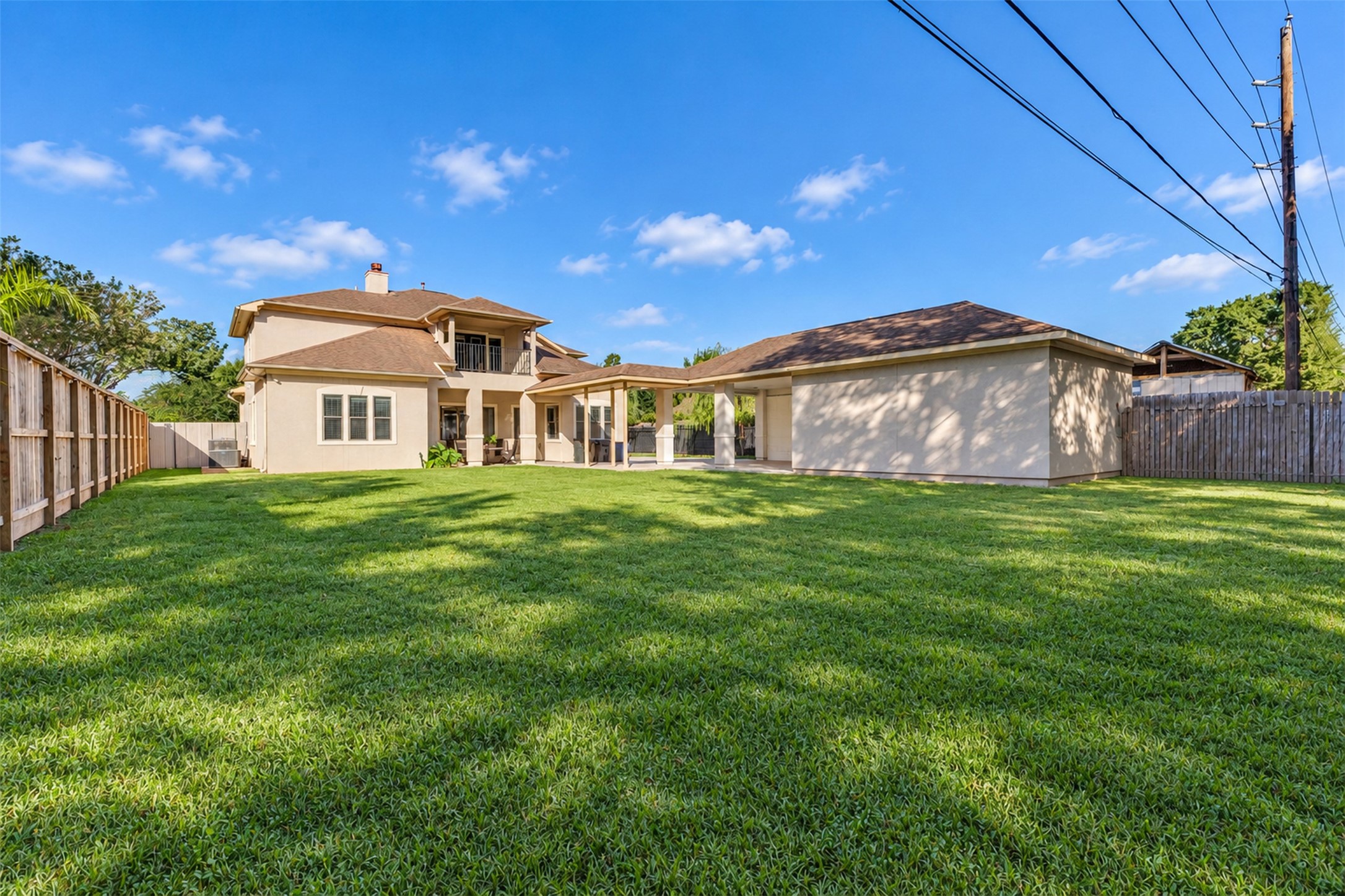 Backyard: A generously sized backyard offers space for outdoor seating, gardening, and entertaining.