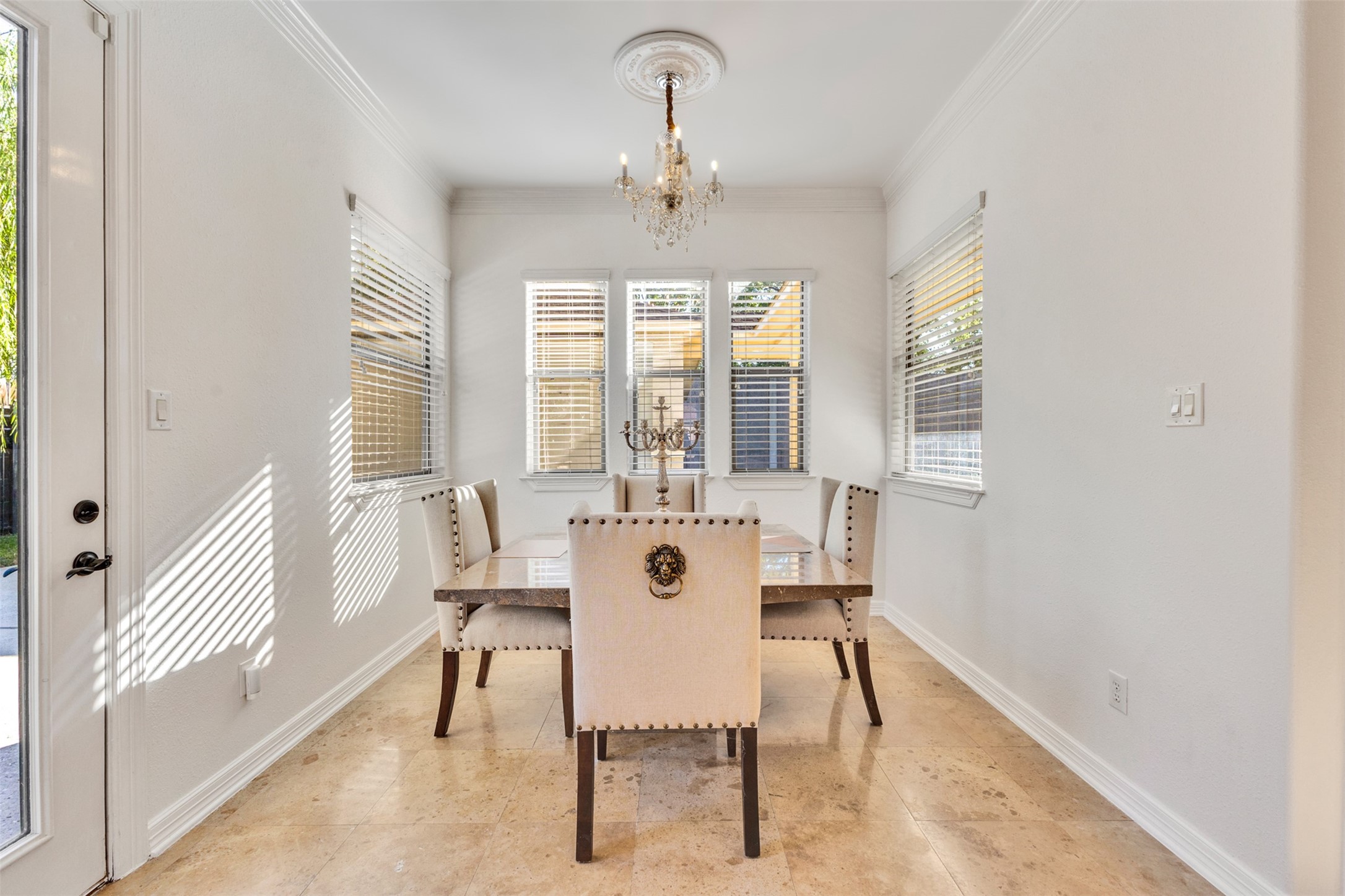 A welcoming breakfast area just off the kitchen offers a comfortable setting for morning coffee and casual dining.