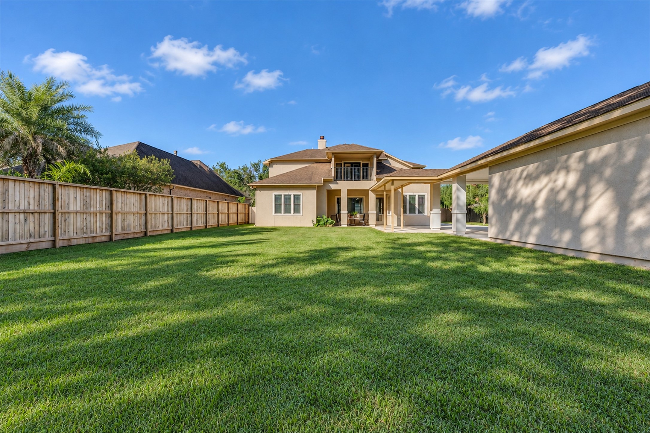 Backyard: A generously sized backyard offers space for outdoor seating, gardening, and entertaining.
