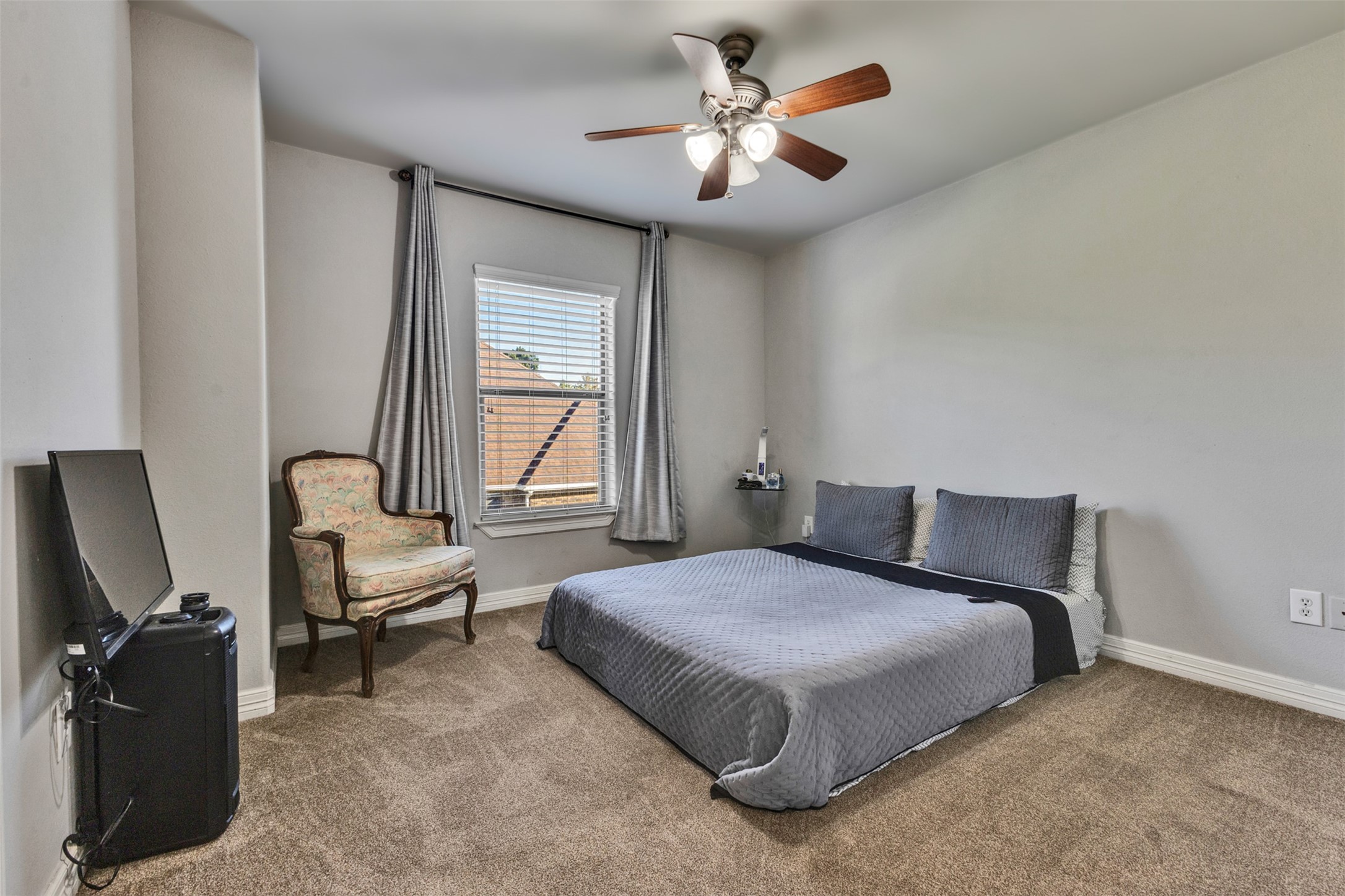 Four spacious bedrooms offer comfort and flexibility, with room for guests, hobbies, or a peaceful personal retreat.