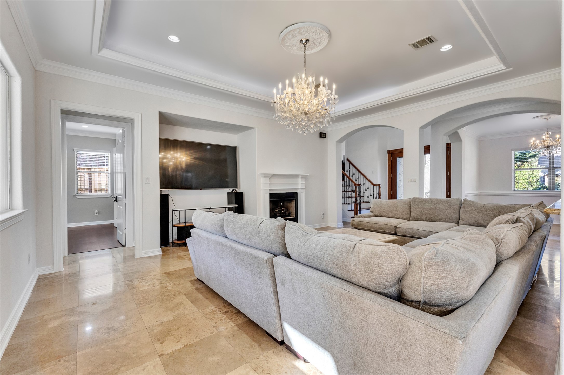 A charming gas log fireplace creates a warm, inviting focal point in the living room.