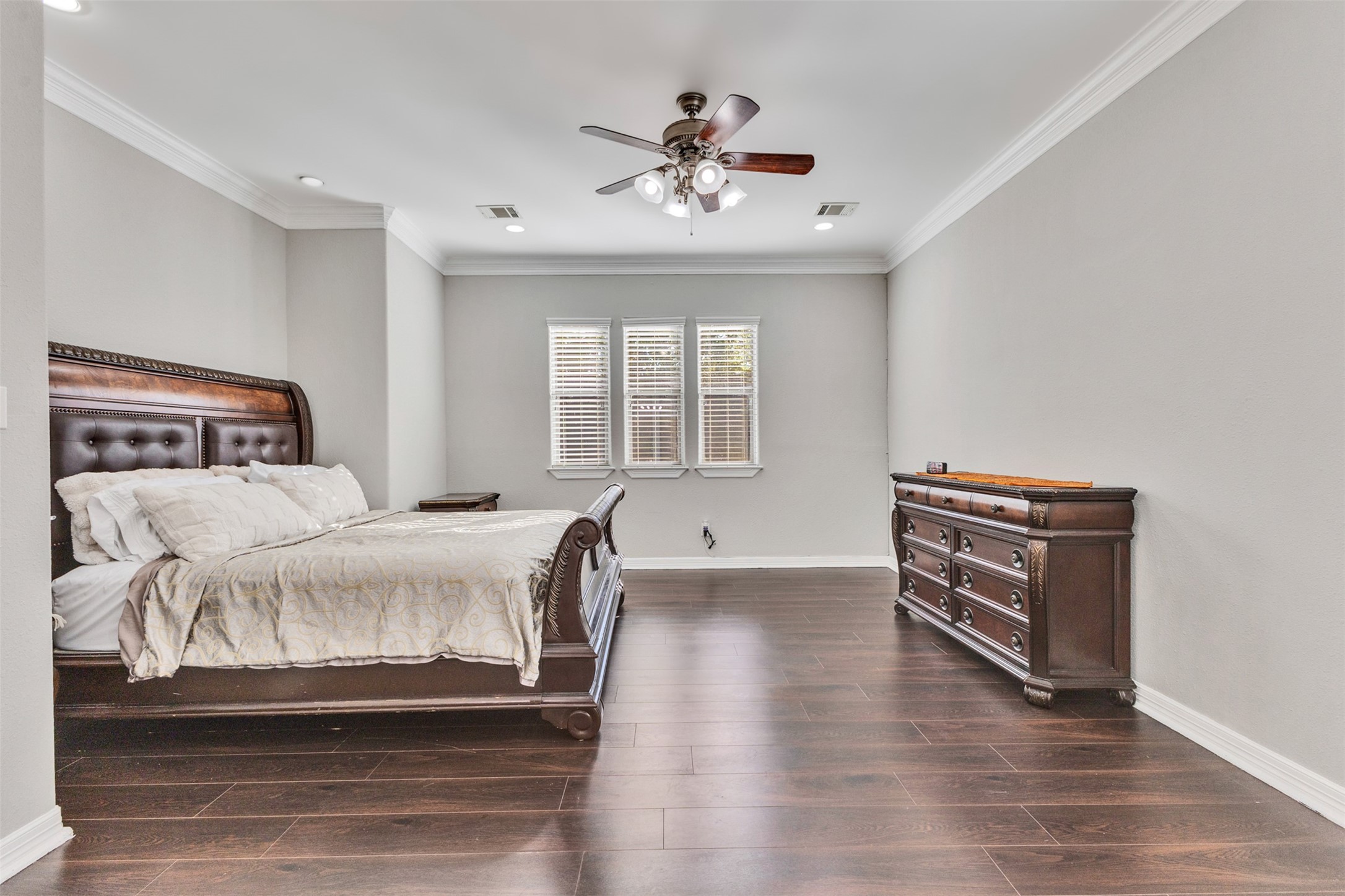 Primary Bedroom: A spacious primary retreat offering room to unwind and create your own relaxing sanctuary.