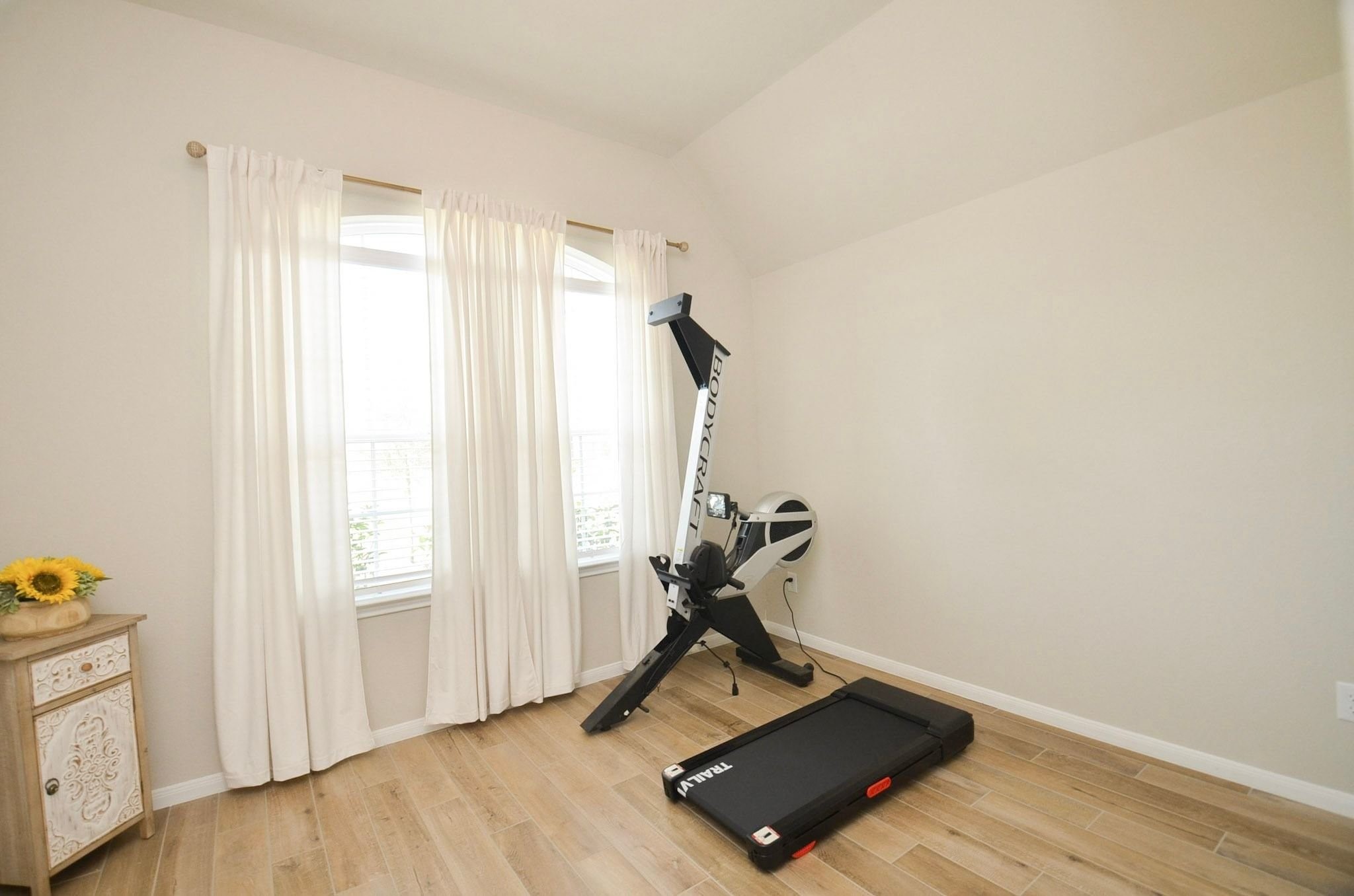 Bedroom 4 of 4 currently being used as a workout space
