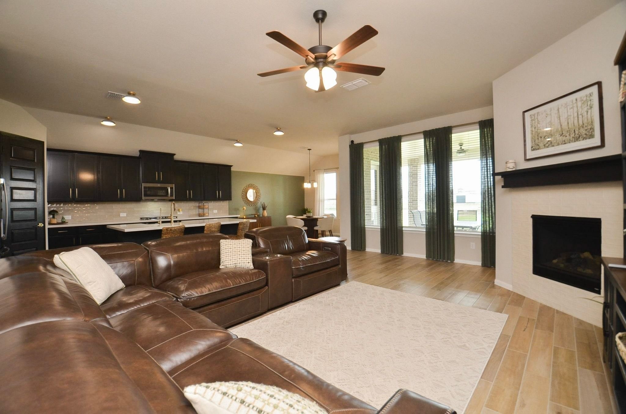 Great view of the family room, kitchen and breakfast room- perfect home for entertaining friends and family