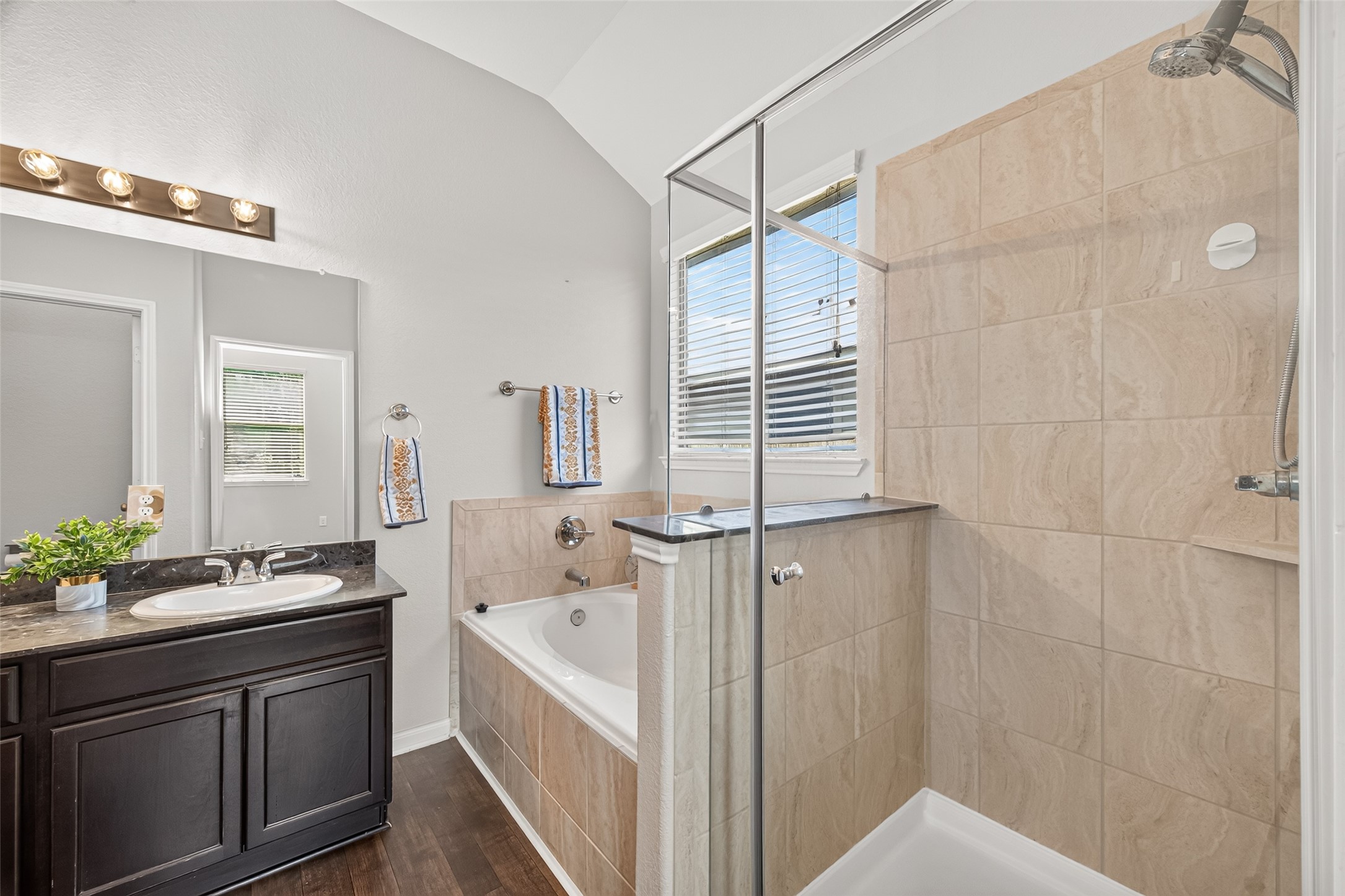 Enjoy a touch of spa-like relaxation in this primary bathroom