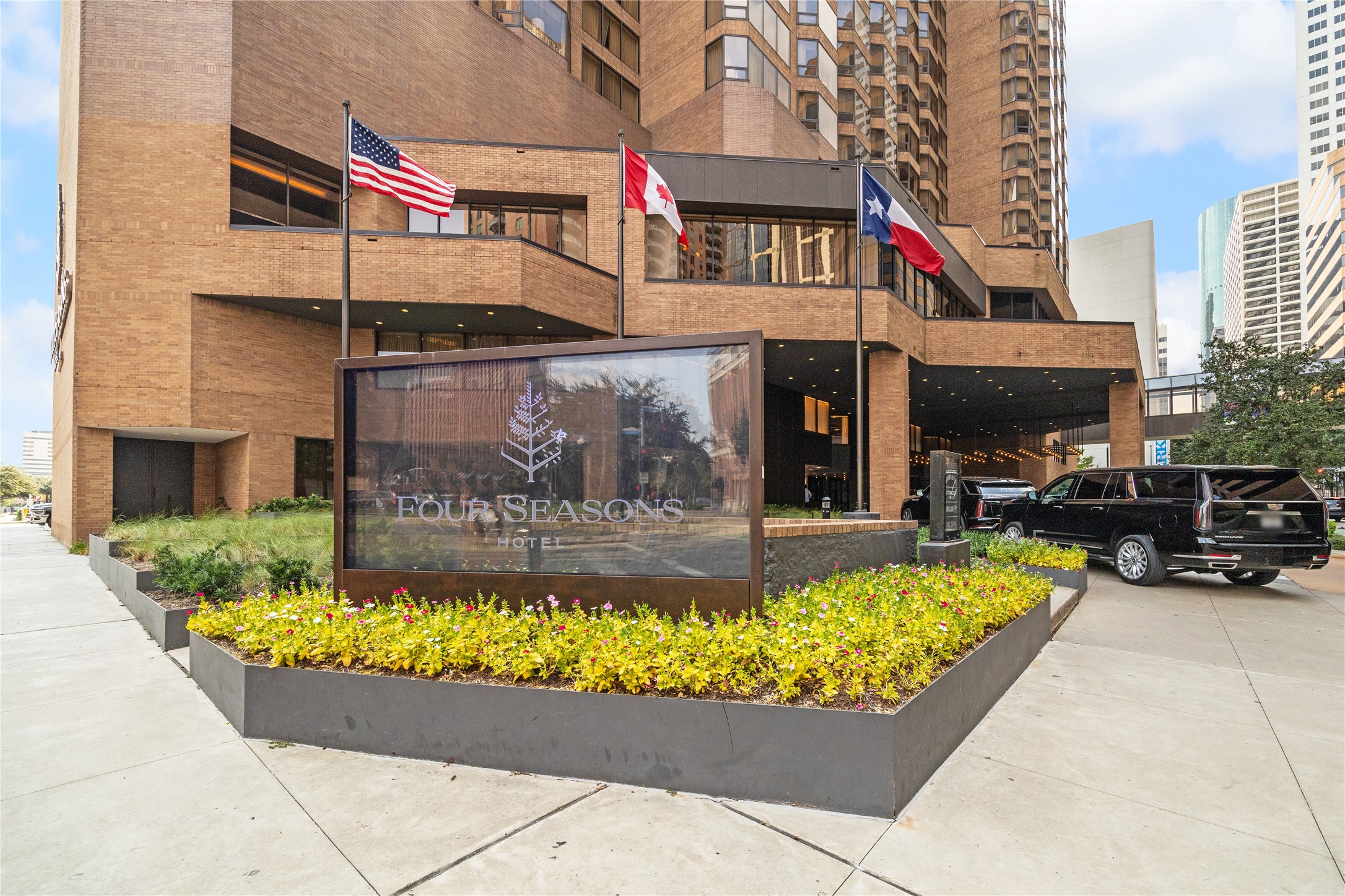 Rising above downtown, the Four Seasons offers a full-service hotel on the lower floors with exclusive private residences above.