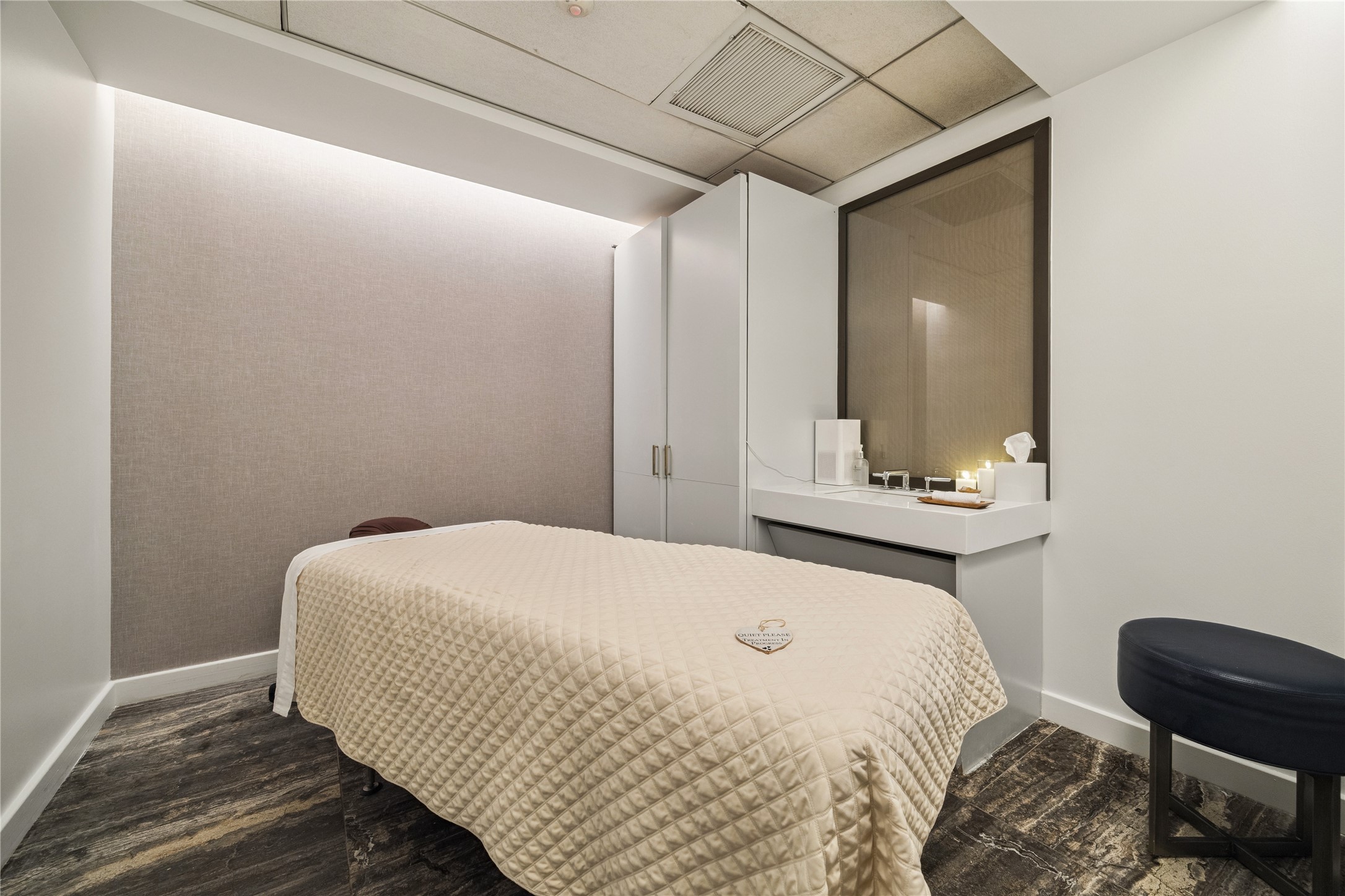The spa features intimate treatment rooms offering massage, facials, and restorative therapies. Neutral tones, soft lighting, and modern finishes create a calming atmosphere for a true wellness escape.