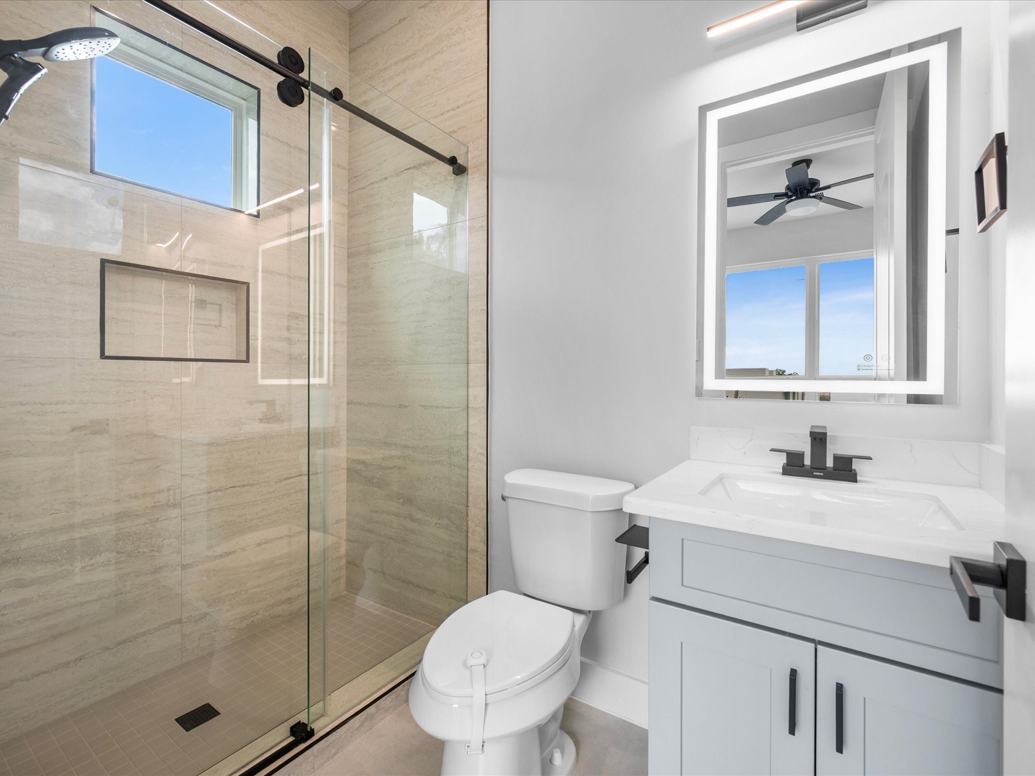 The third full bath offers a private bathroom for the homes third bedroom, giving each bedroom its own ensuite.