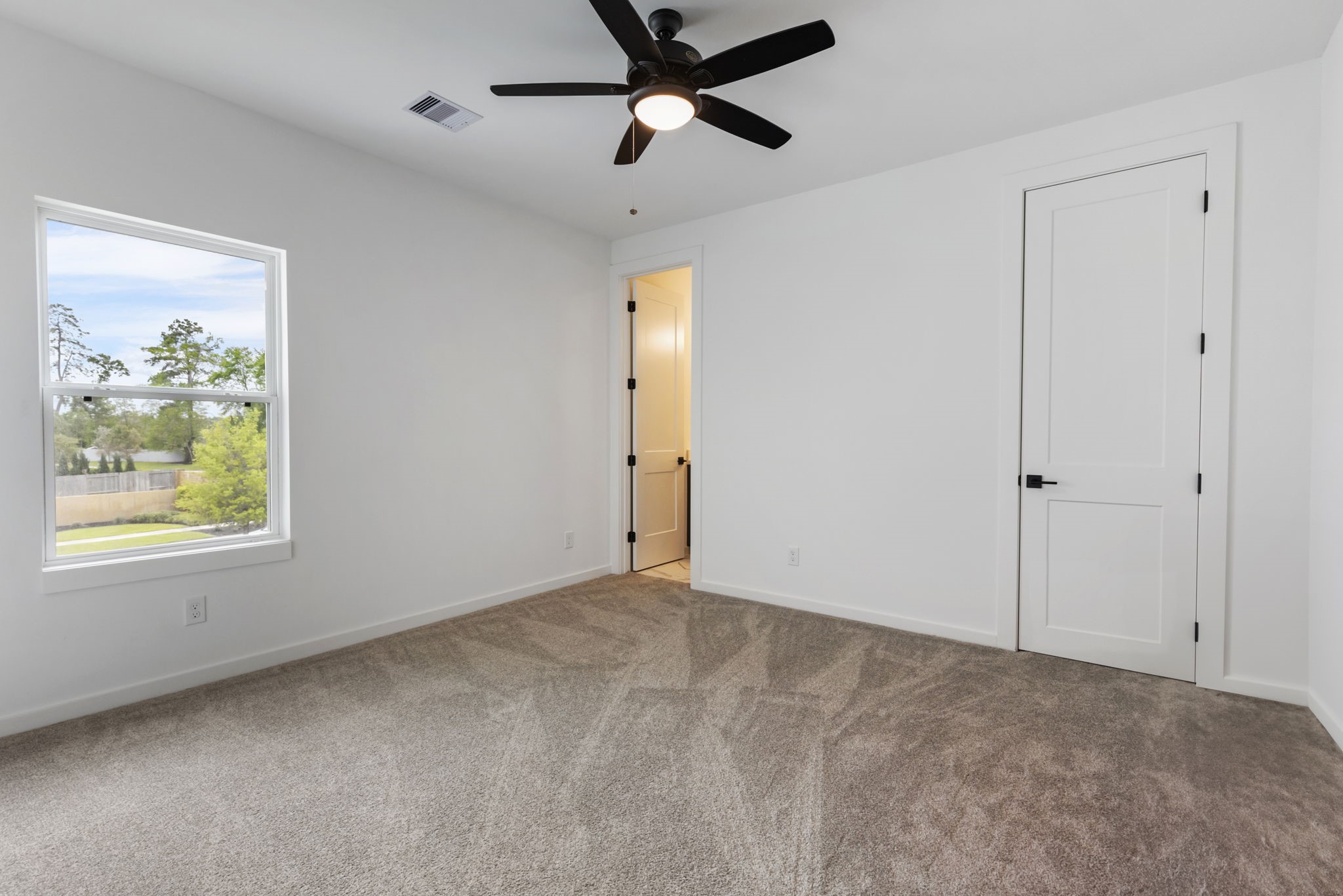 Secondary bedroom with ensuite on second floor.