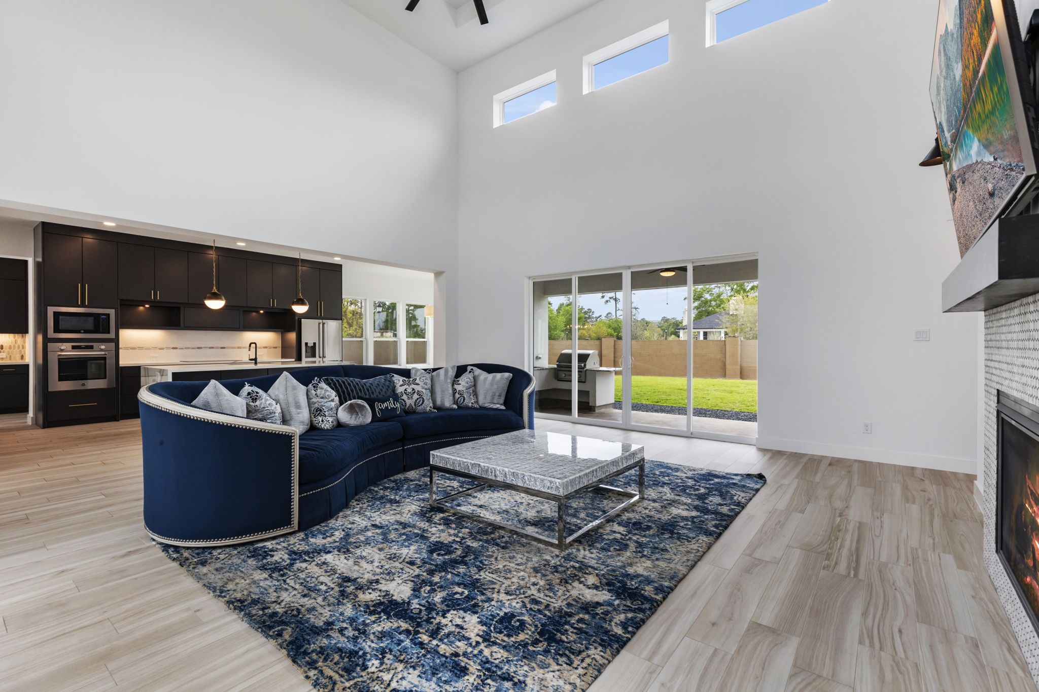 Living room offers a lot of natural light while still providing privacy.