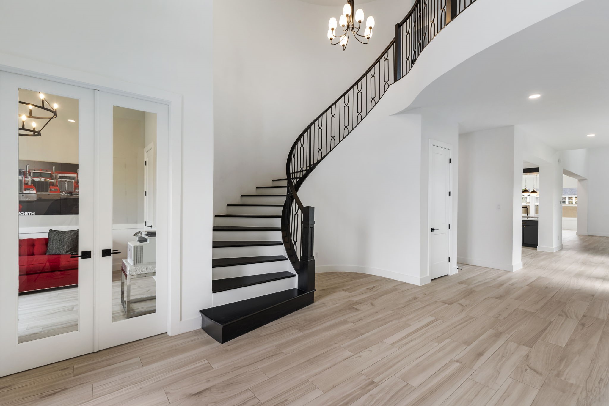 A study will be on your immediate right with glass double doors.