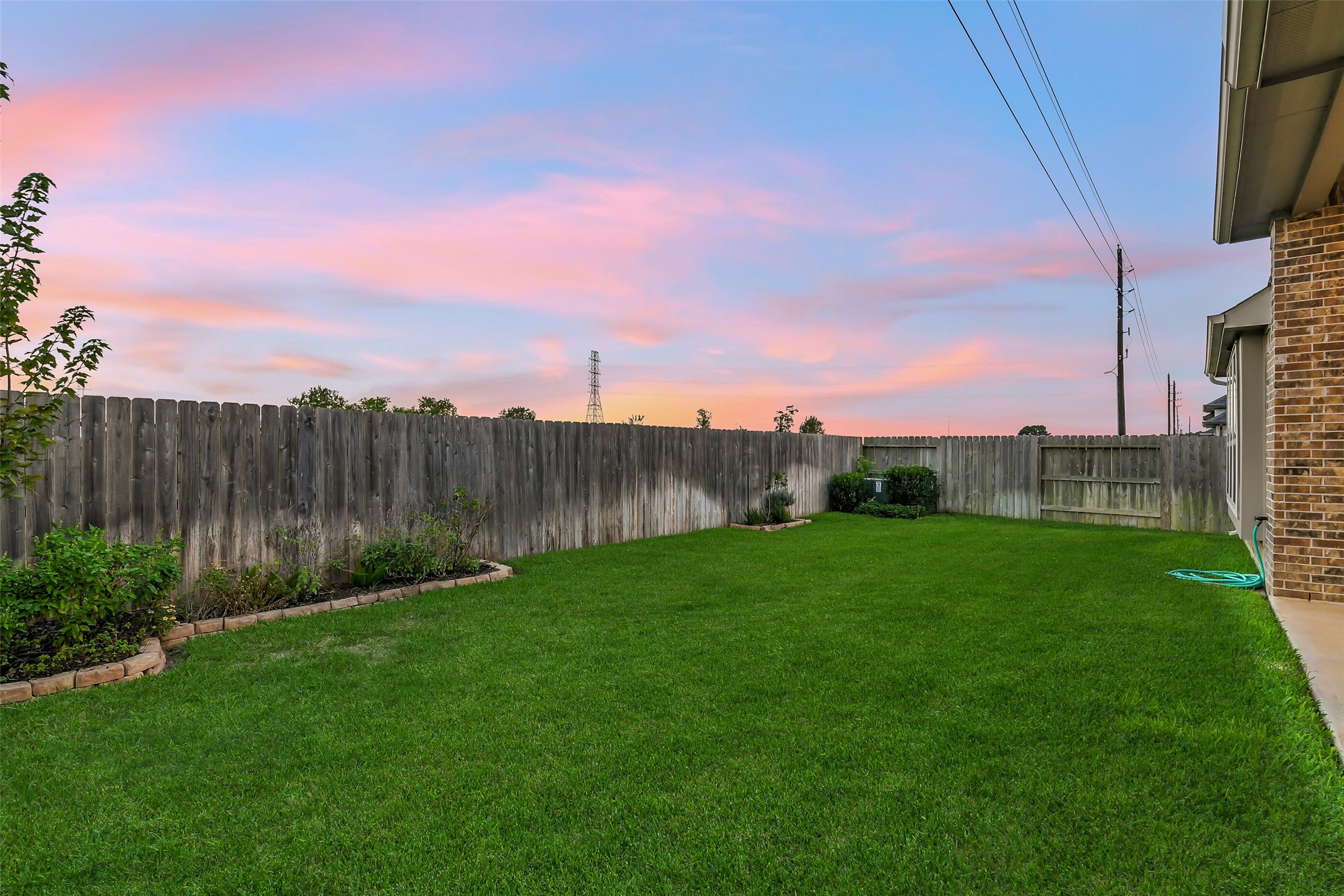 Fully fenced and landscaped backyard with no backdoor neighbors.