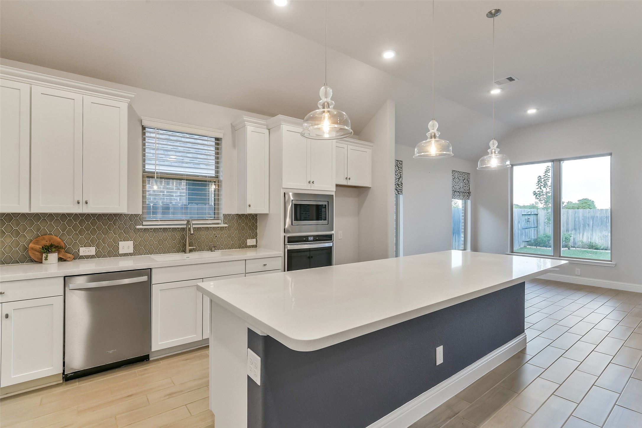This quartz island has plenty of room for additional seating with barstools.