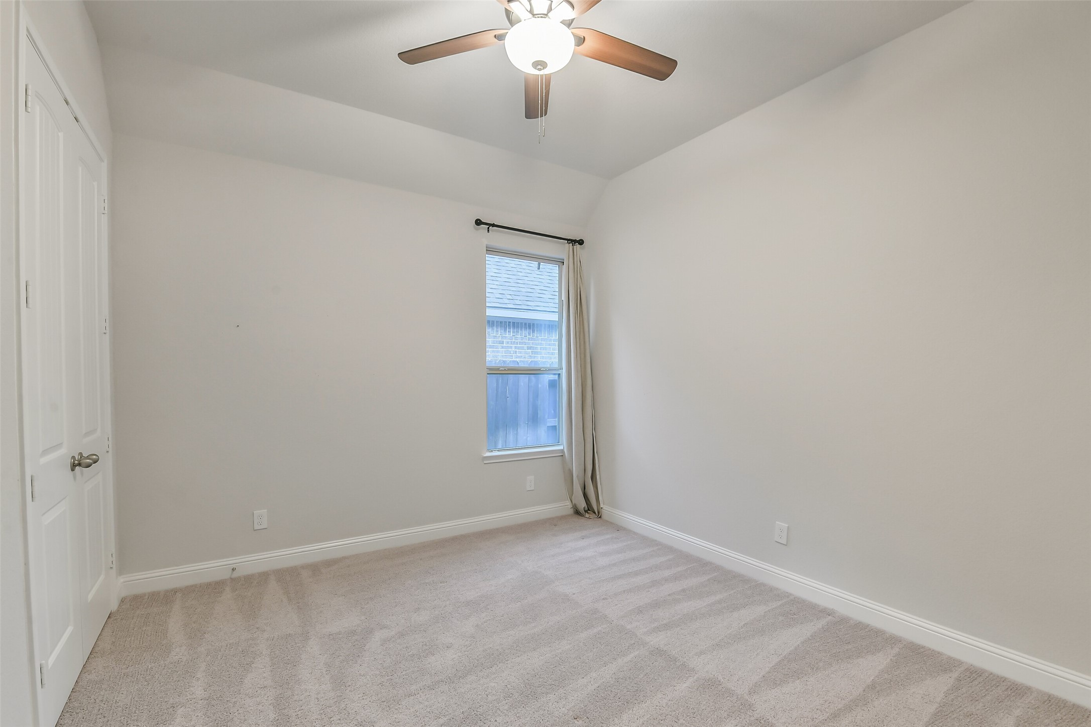 Secondary bedroom #3 with ceiling fan