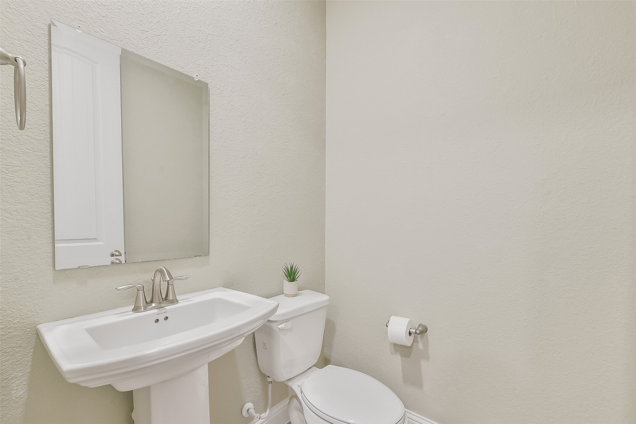 Convenient half bath.