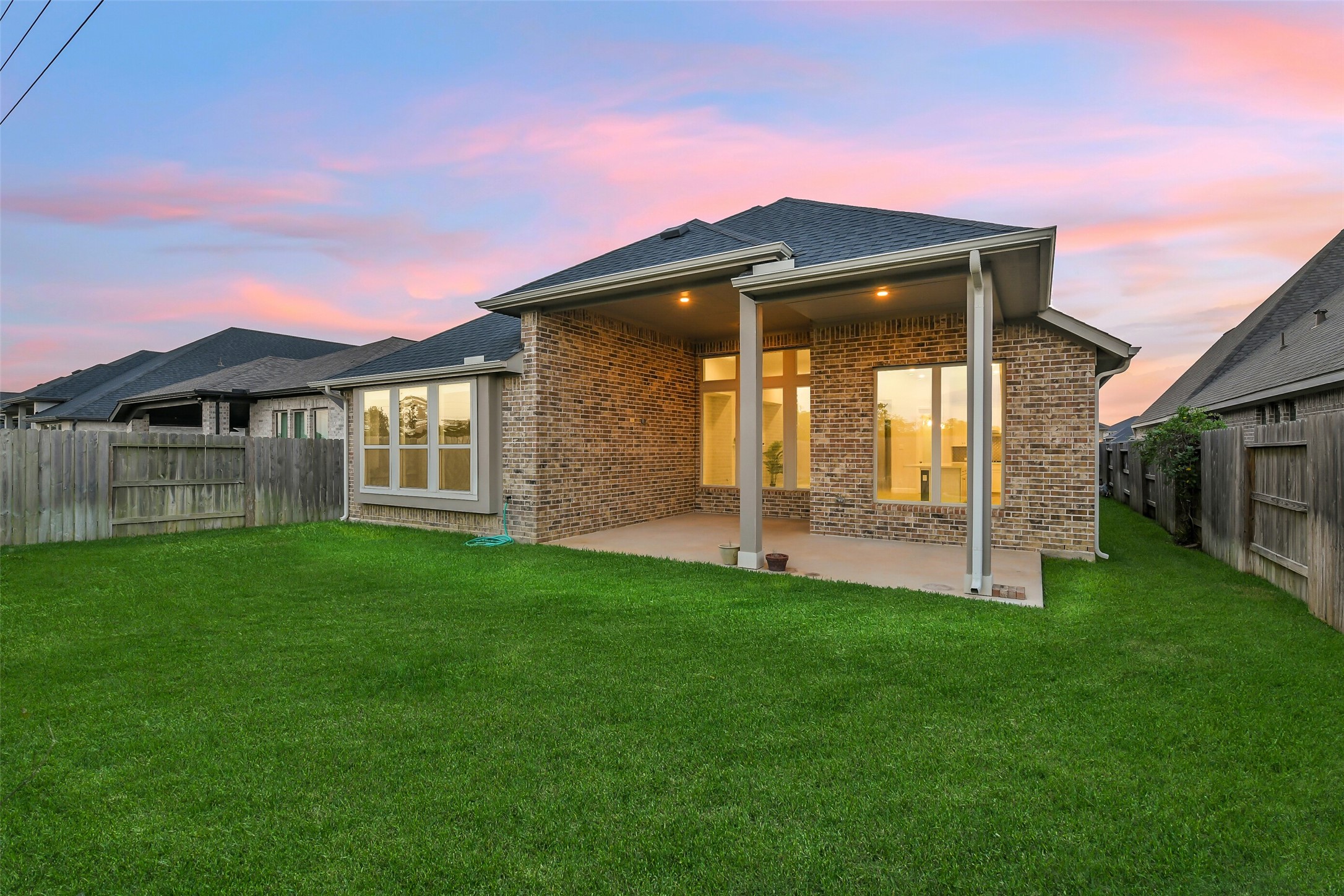This large porch and backyard are perfect for entertaining.