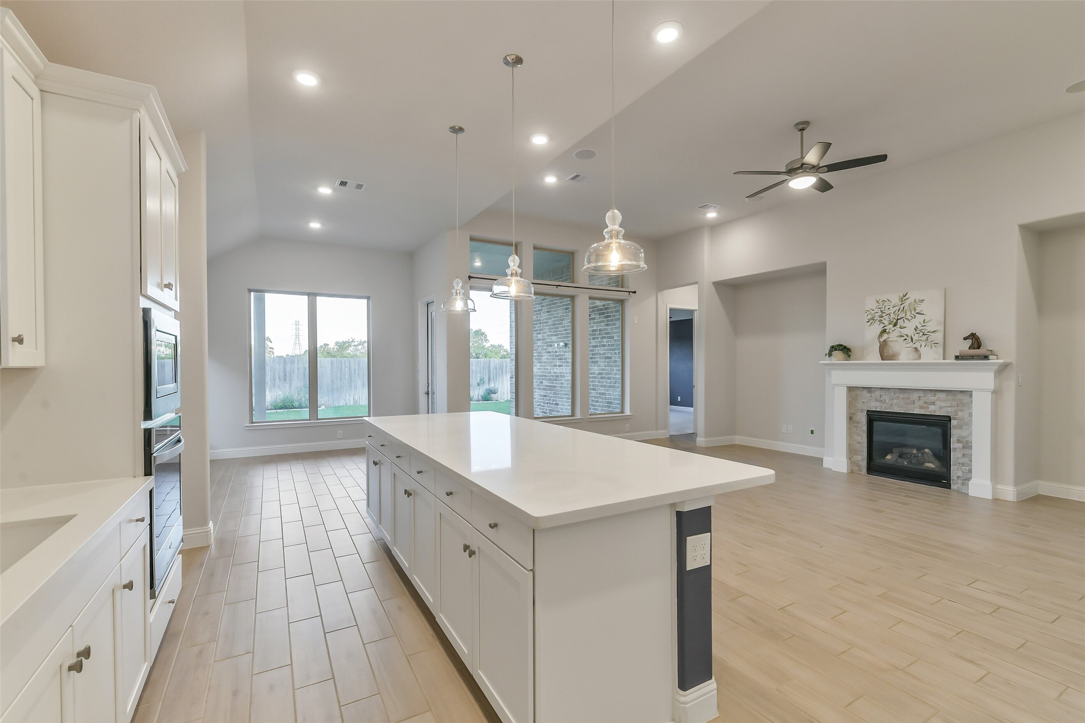 The kitchen flows nicely into the living room and breakfast area, where the cook doesn't feel left out of the action.
