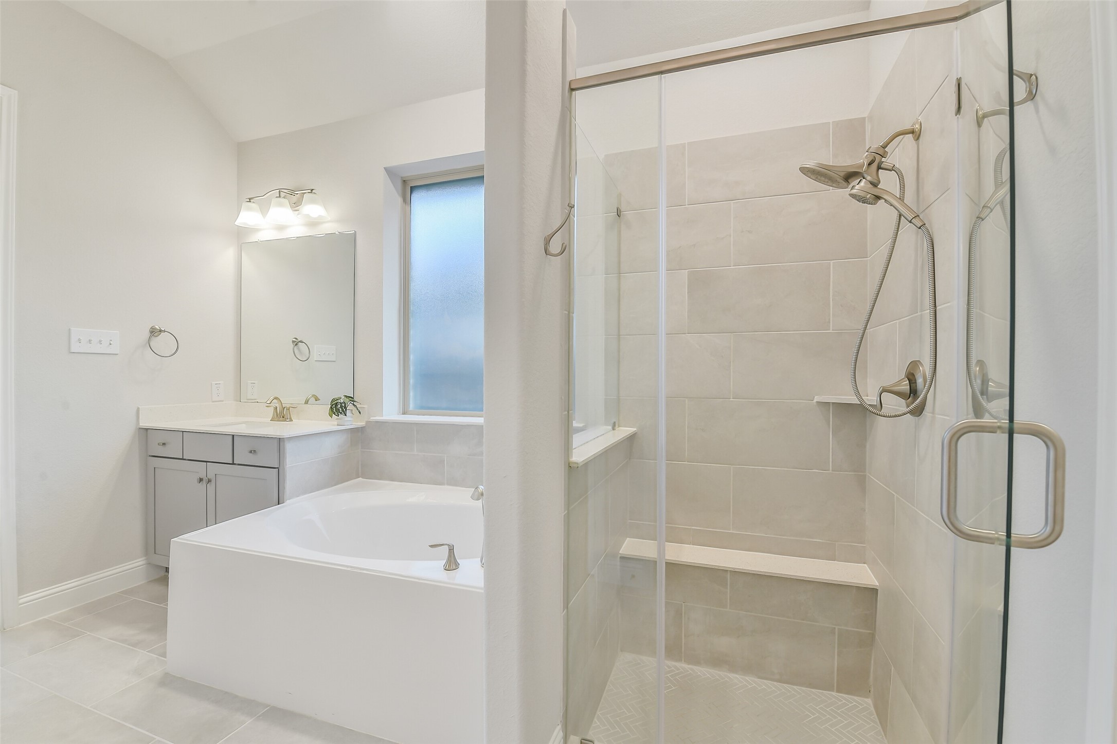 Beautiful soaking tub and large walk in shower.