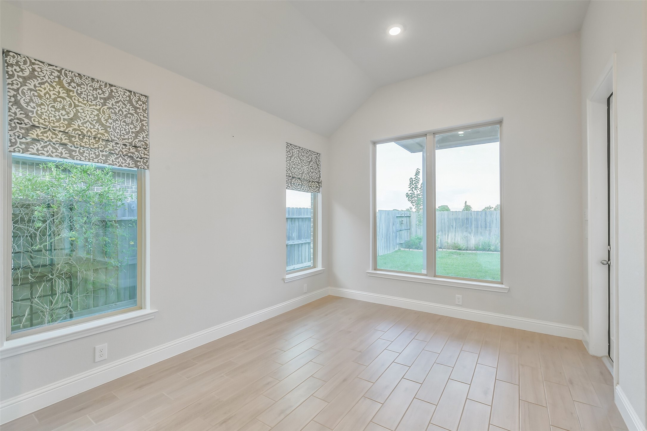 Natural light from the windows brighten this dining area.