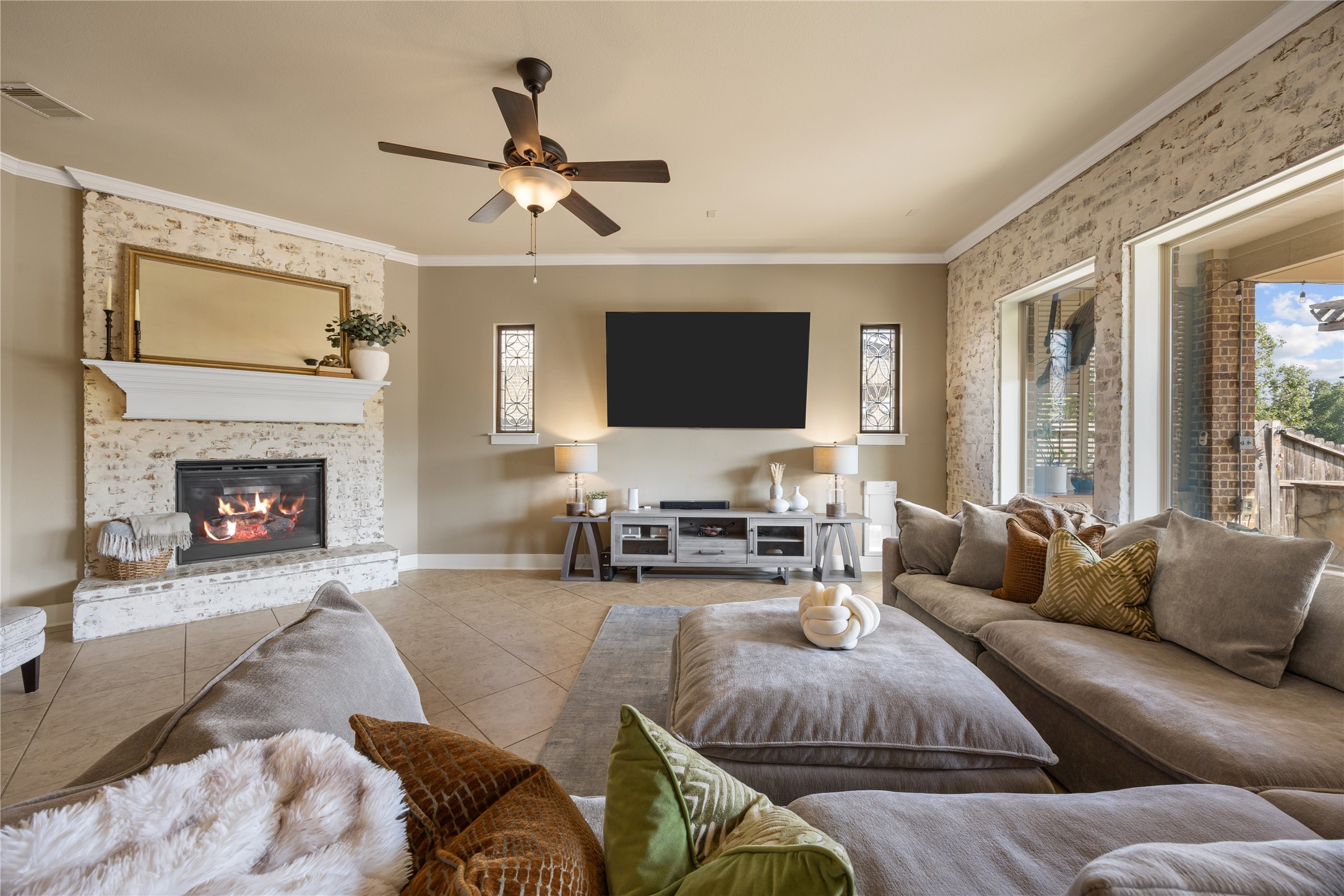 An inviting open-concept layout seamlessly connects the family room and kitchen, creating an ideal setting for gatherings and entertaining.