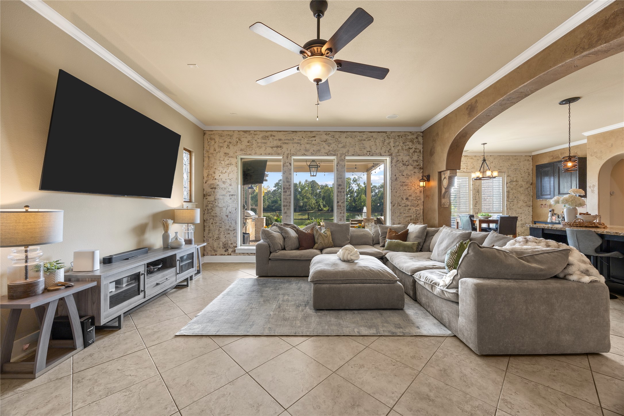 Spacious family room designed for comfortable everyday living and entertaining, with an open layout connecting the kitchen and dining areas.