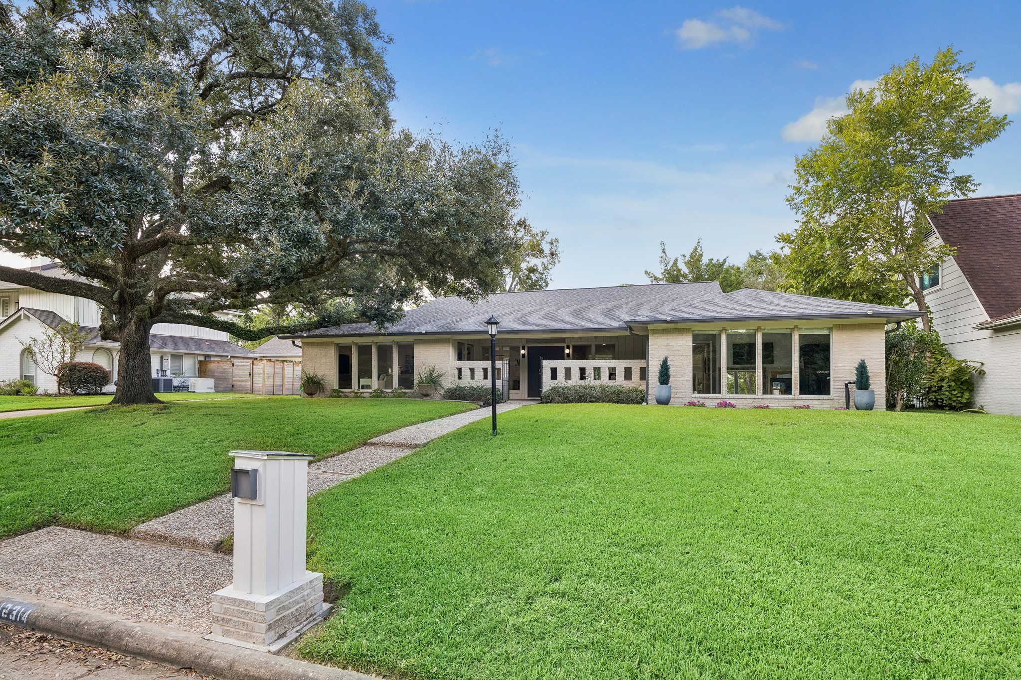 This one story home sits on a 16,863 sf lot with this stately oak tree on the front lawn. In 2022 a new roof, gutters, HVAC, and ductwork were installed. This one story home sits on a 16,863 sf lot with this stately oak tree on the front lawn. In 2022 a new roof, gutters, HVAC, and ductwork were installed.