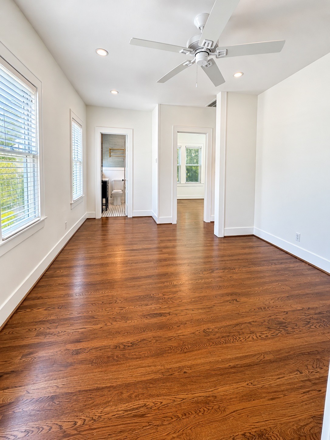 The spacious living room, shown without furniture, offers a blank canvas to create your perfect space.