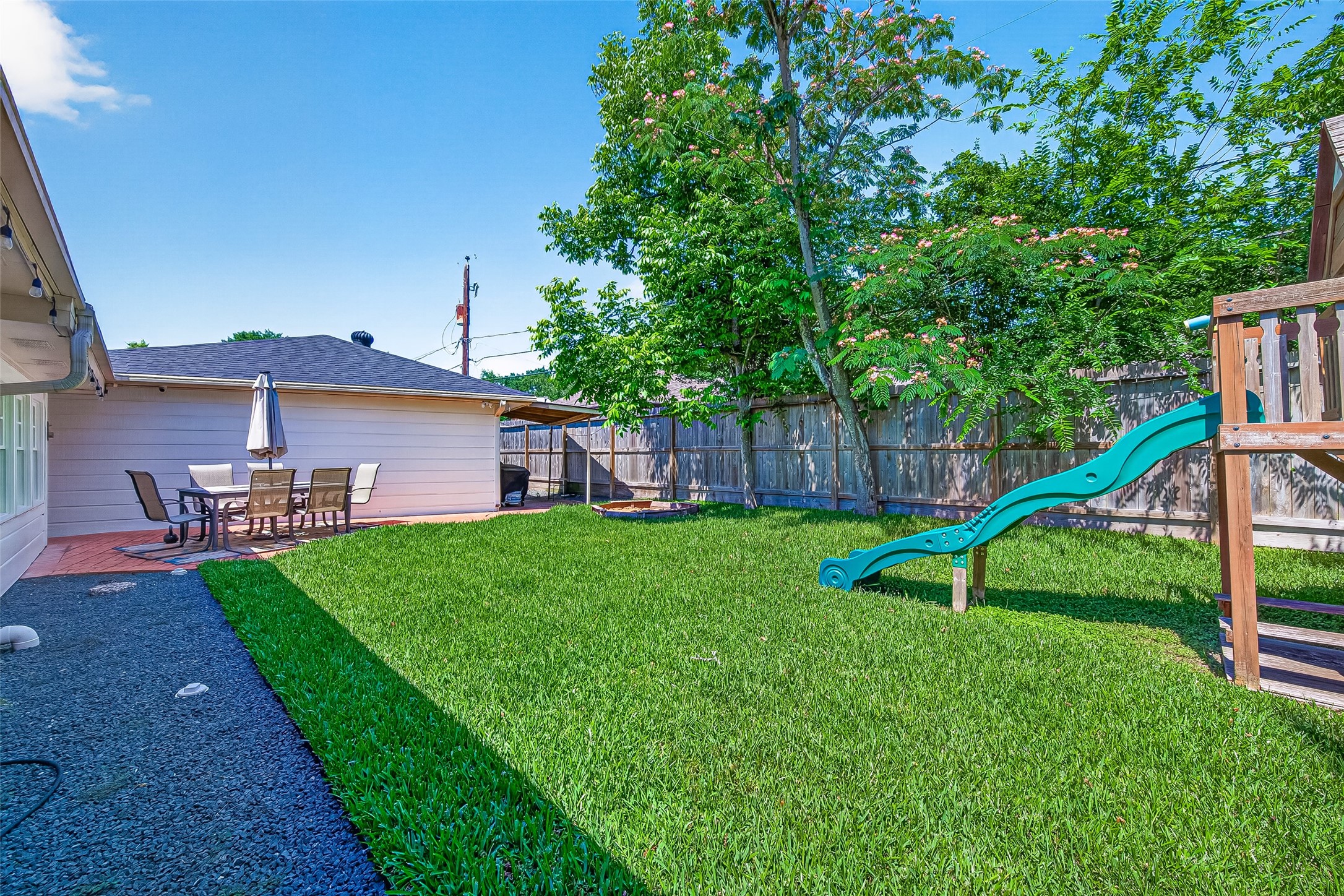 This 8,800sf lot carries endless potential for entertaining, outdoor living, or creating your dream backyard retreat.