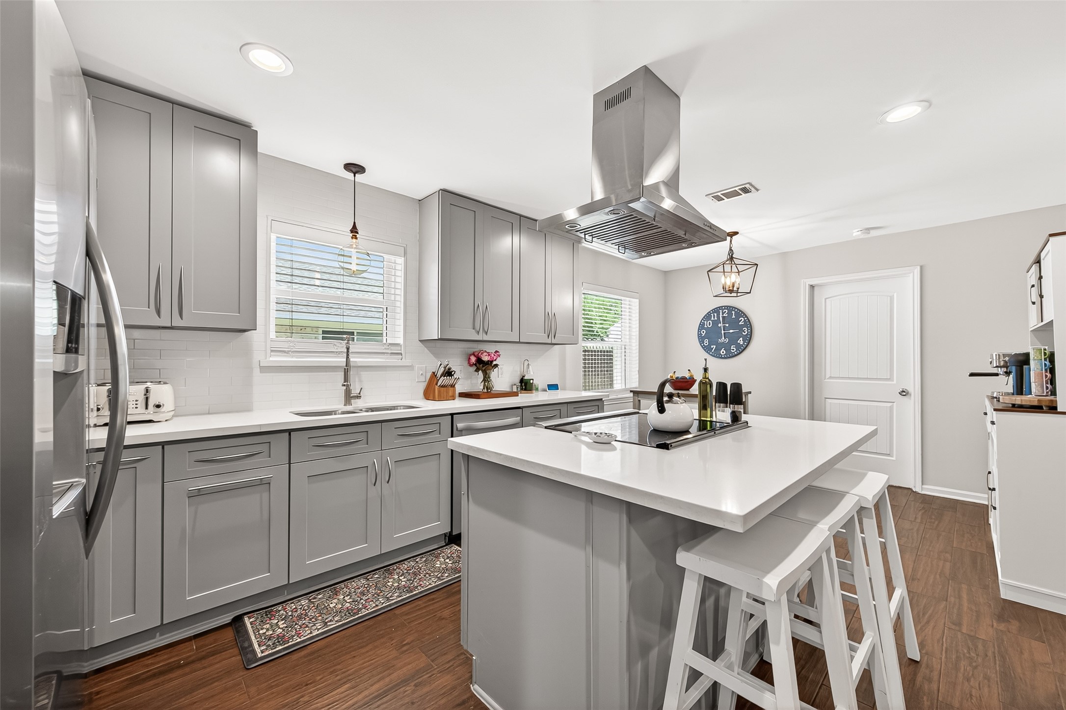 This home offers multiple inviting dining spaces, including bar seating at the kitchen, a dining room, and a cozy breakfast nookproviding plenty of options for everyday meals and entertaining.