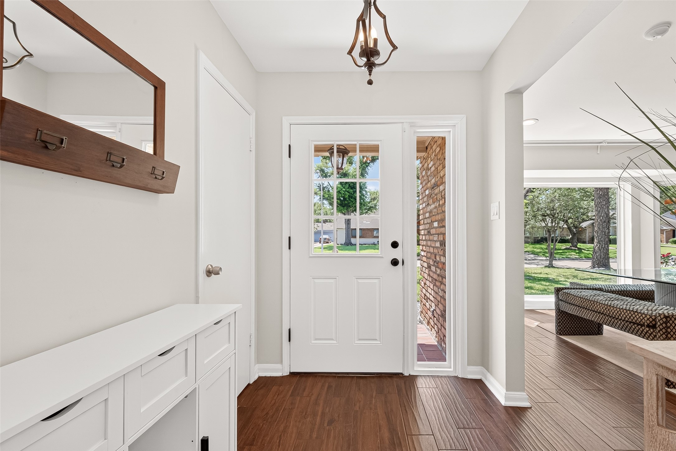 Bright and welcoming entryway. Front door May 2026.