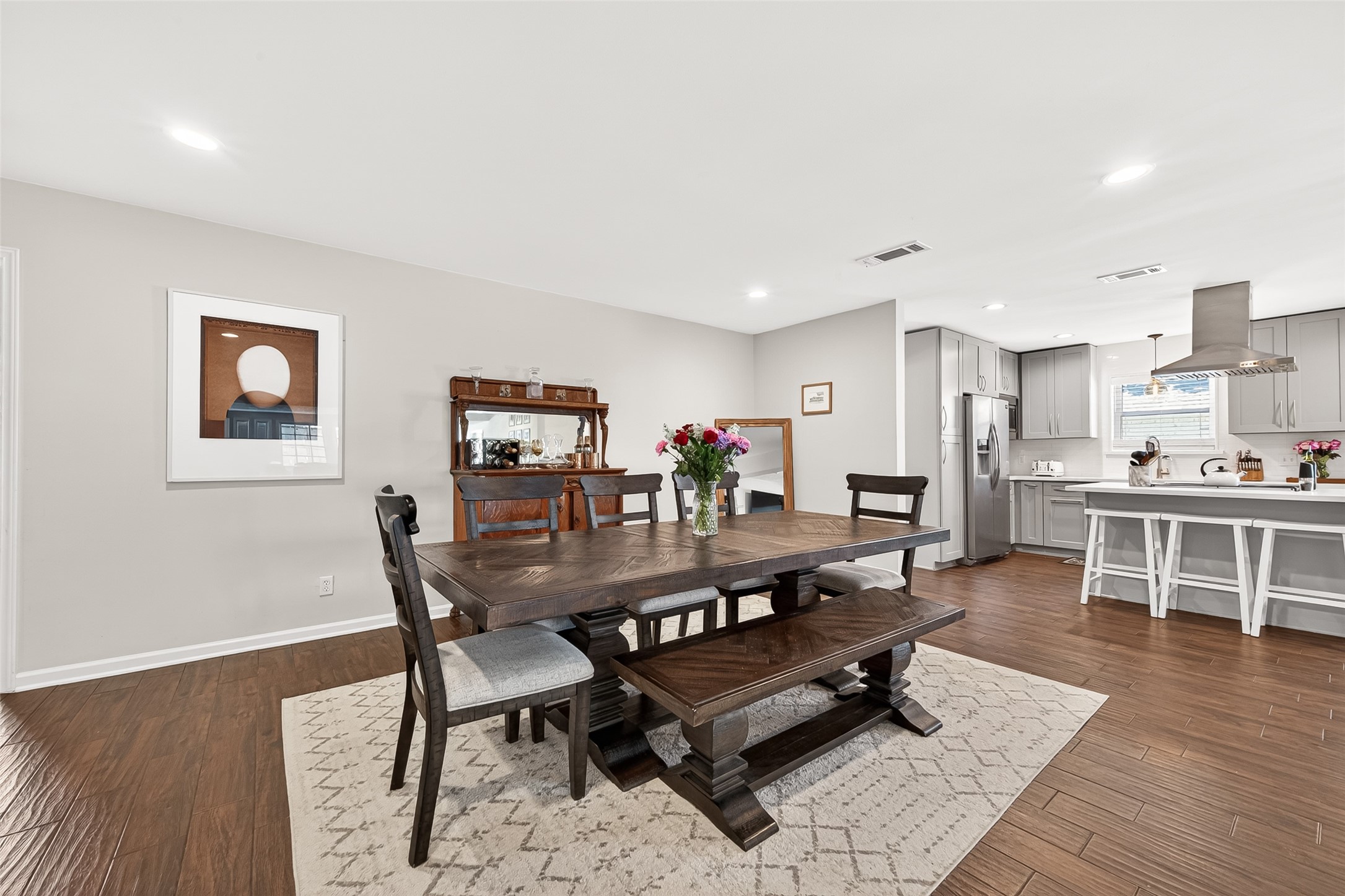 The dining room is in front of the fireplace and sets the tone for the house - warm and inviting.