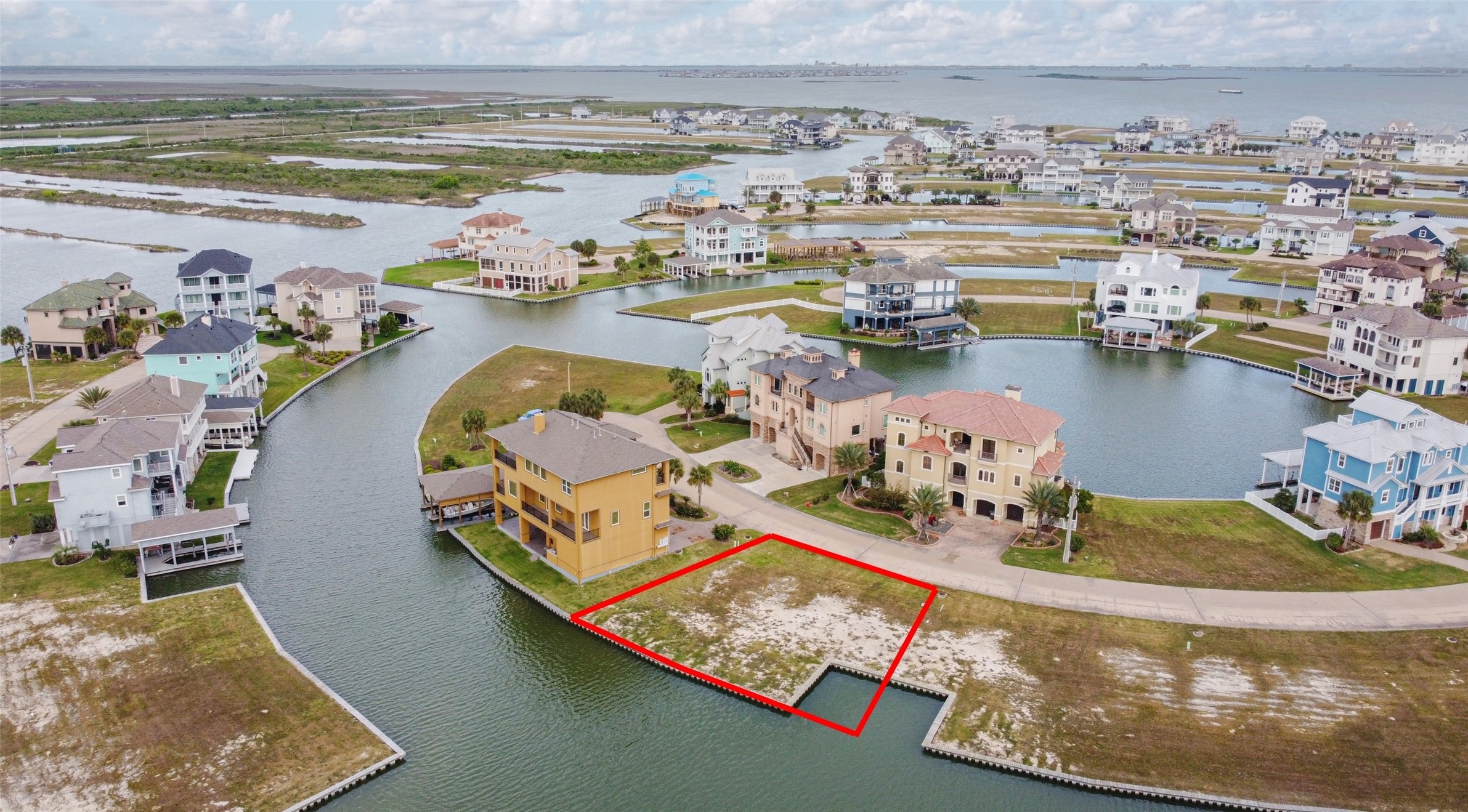 This beautiful marina-side lot is tucked near the end of a cul-de-sac in the heart of Harborwalk, offering a peaceful setting within this sought-after waterfront community. Harborwalk features a manned gated entrance, plus an additional gated entrance into the residential section of the neighborhood for added privacy and security. Boundary lines are approximate.