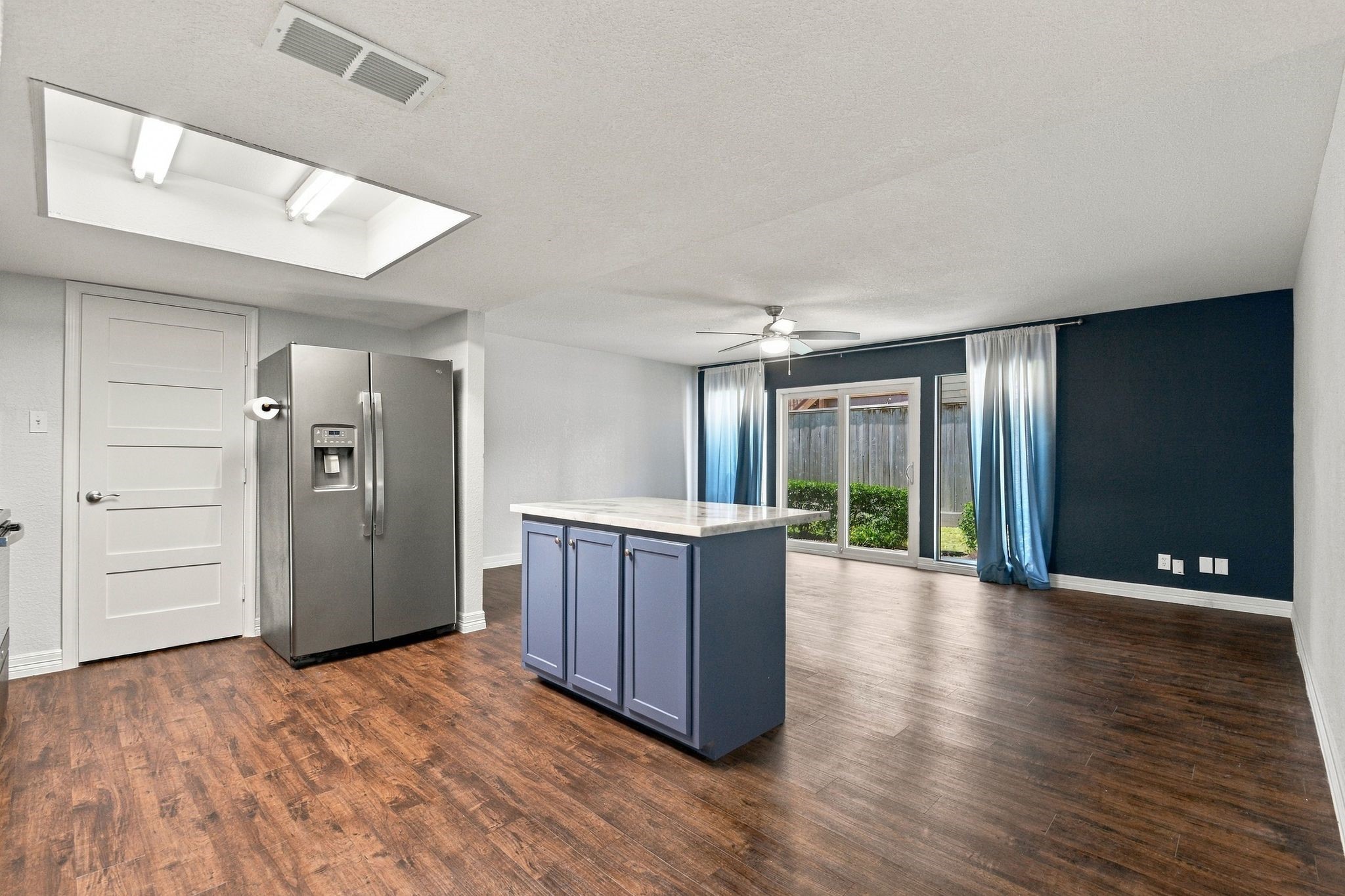 The refrigerator is included as well! The sliding glass door was upgraded and is double paned glass for added energy efficiency. The refrigerator is included as well! The sliding glass door was upgraded and is double paned glass for added energy efficiency.