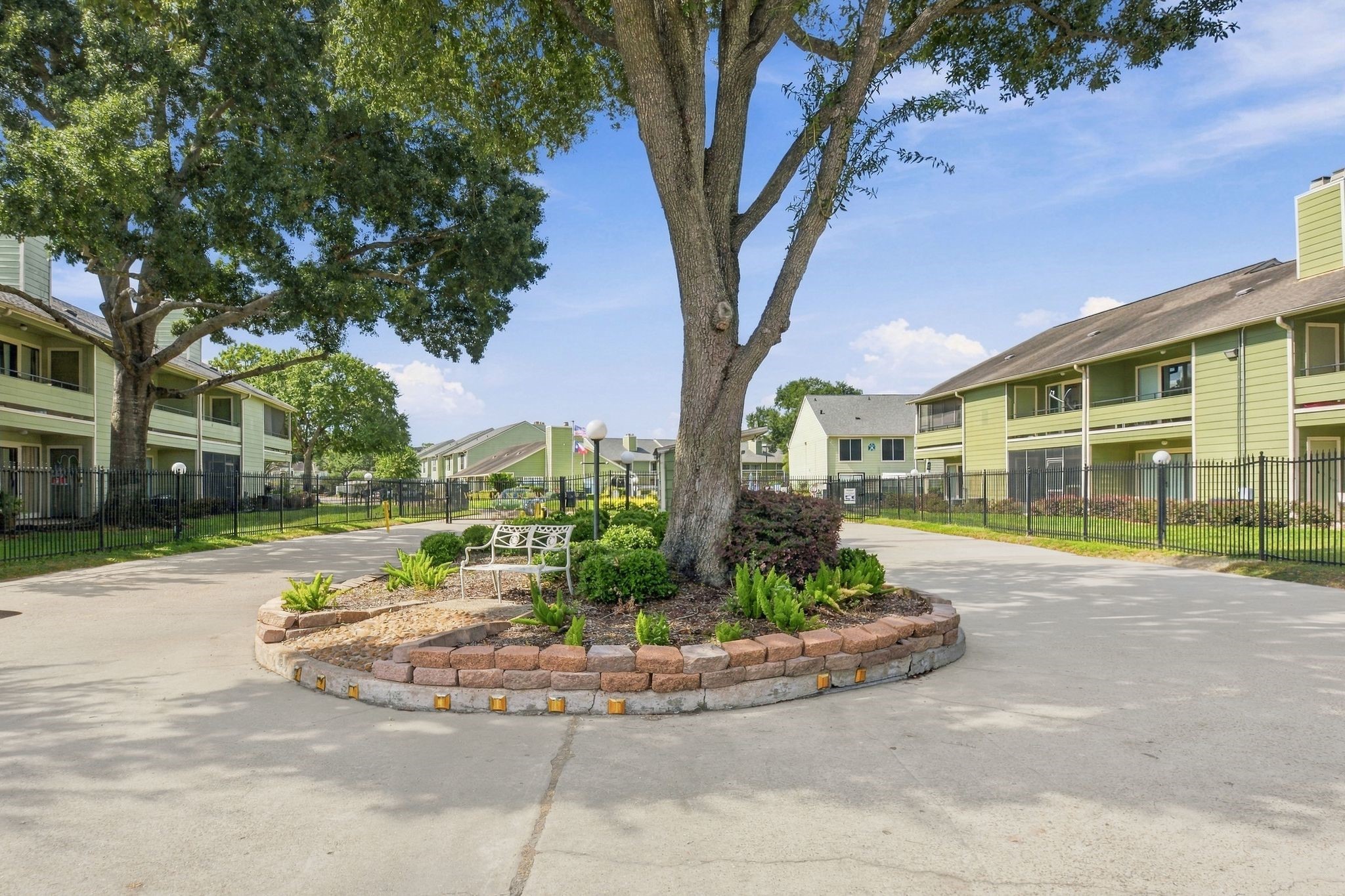 The property also features beautiful landscaping that the HOA maintains.  It also includes garbage, exterior insurance and maintenance and all of the amenities in the community.  And the gated entrance - private roads are maintained by the HOA as well.  Your homeowners insurance is reduced since the HOA includes the exterior coverage.