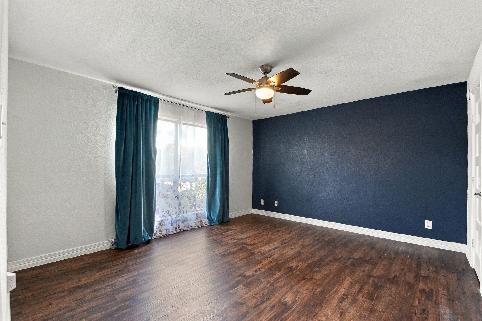 There is an accent wall painted in the Primary Bedroom which is also very large and has a beautiful large window for natural light.