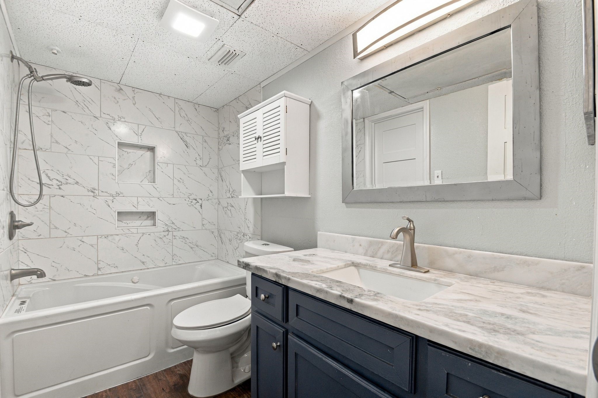 The Bath is nicely upgraded as well with matching quartz counters, upgraded toilet and a jetted tub/shower combo.