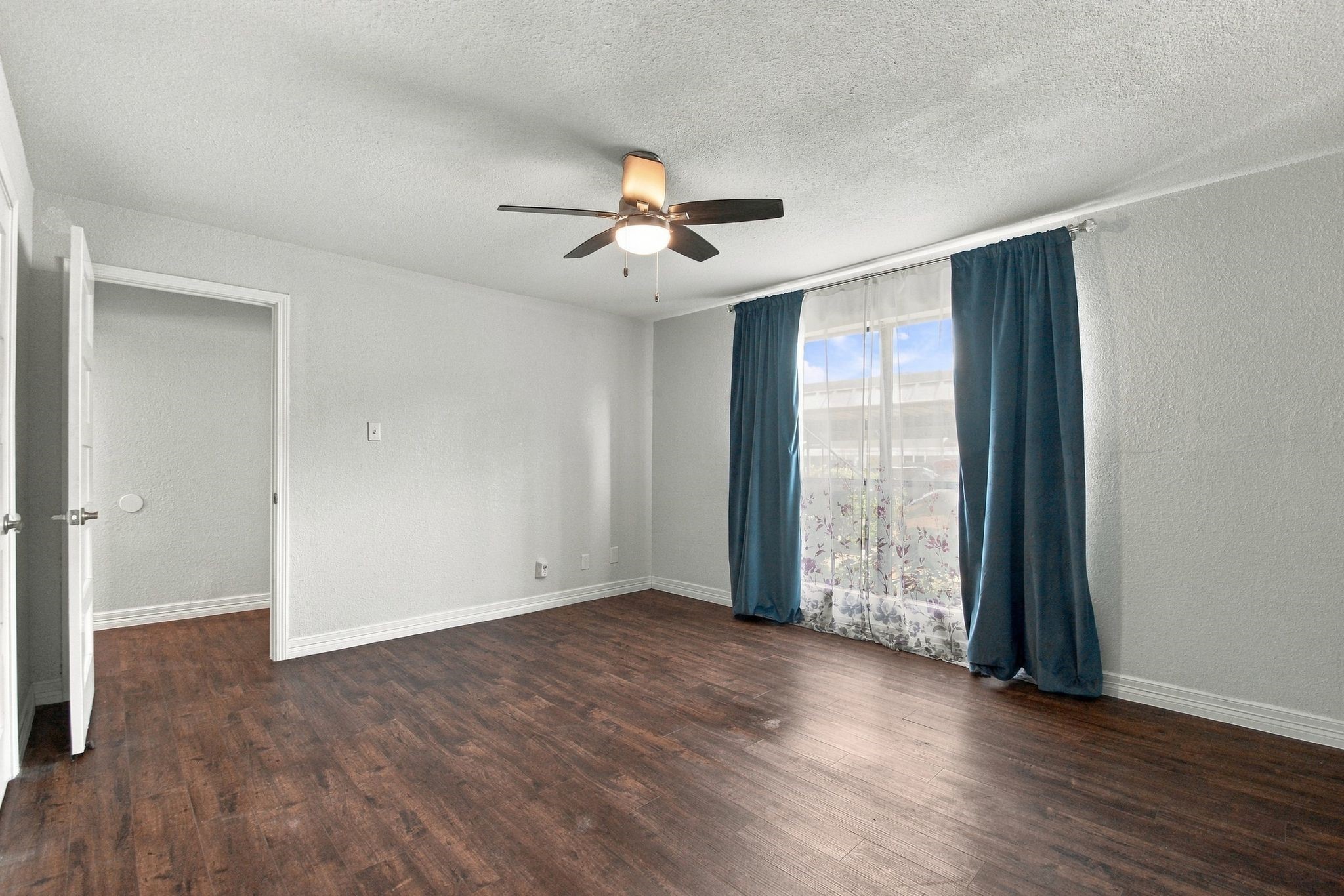 There are two full walls and it is a great layout - no carpet anywhere!