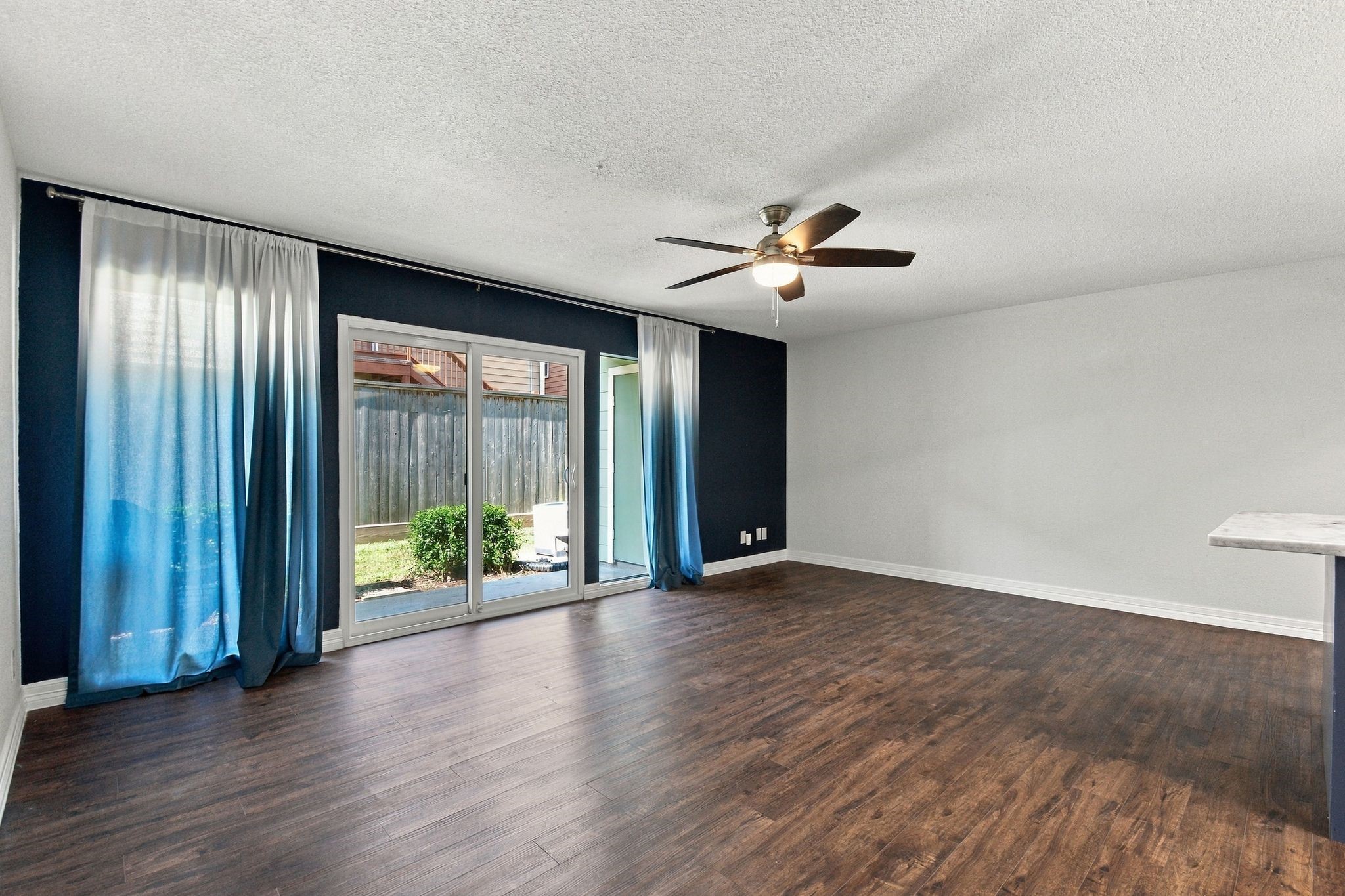Beautiful wall of windows and easy access to your private covered patio. Beautiful wall of windows and easy access to your private covered patio.