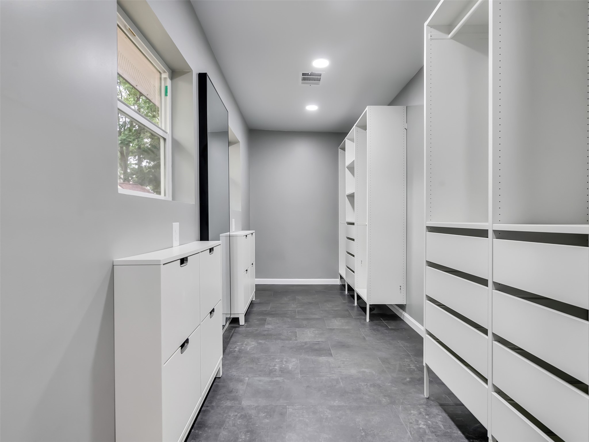 Brand new custom closet with built-in storage.