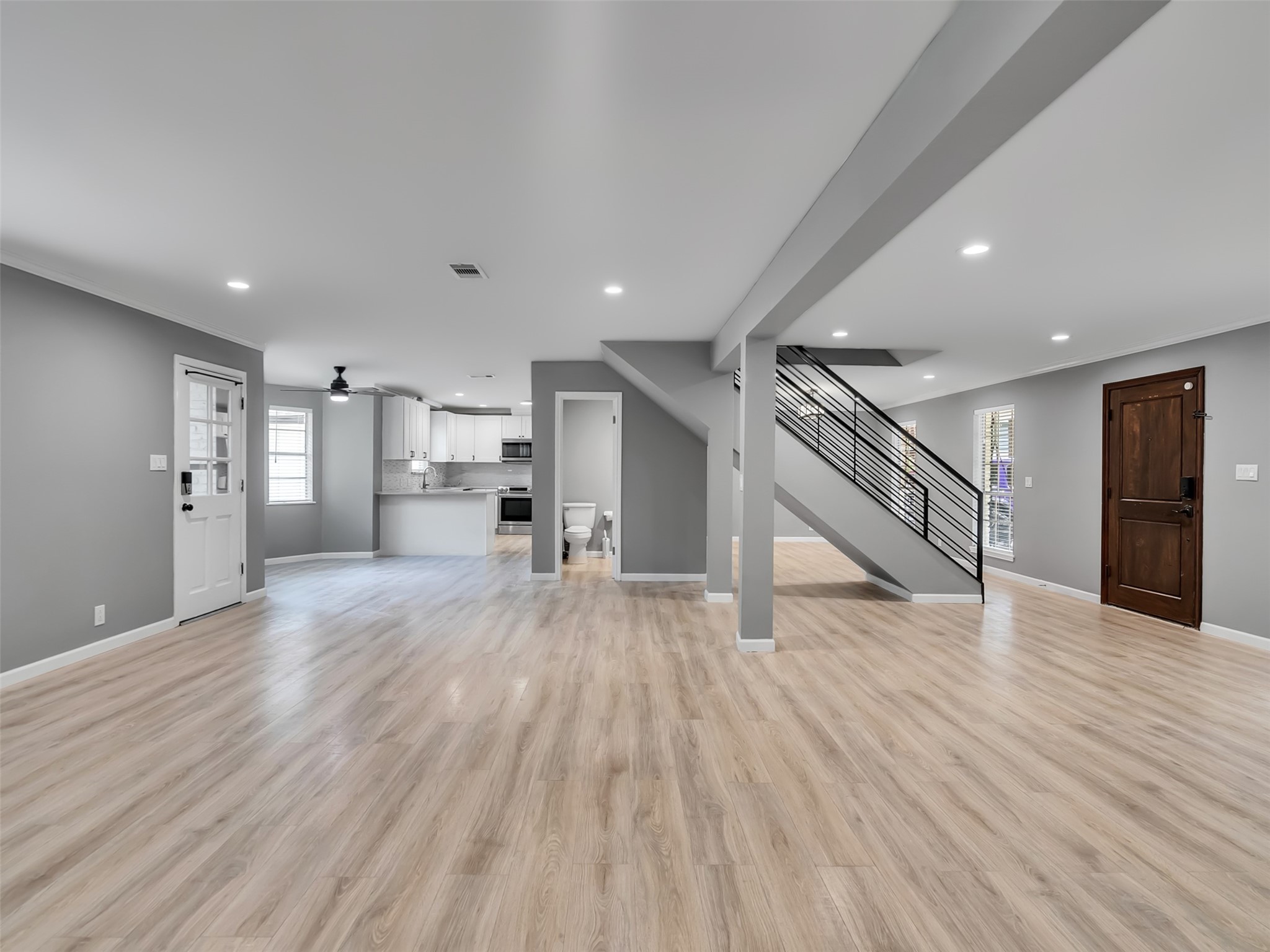 Open living that flows nicely into the kitchen and flex space by the front door.