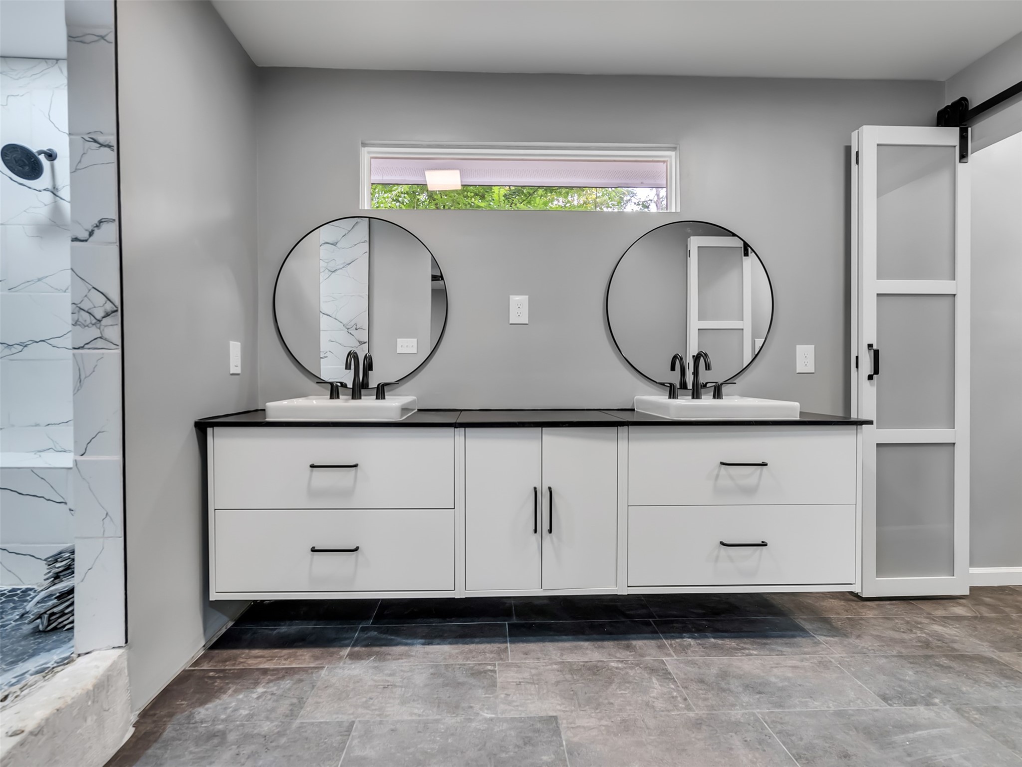 Downstairs primary ensuite with large walk-in shower.