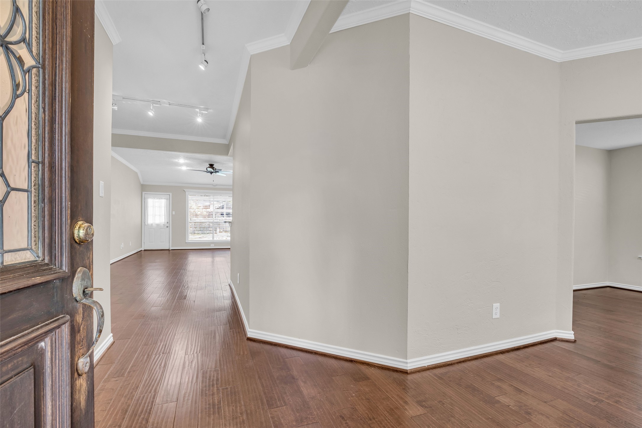 Welcome to 14 Almond Branch.  Dining Room to the right.  Living Room straight ahead.