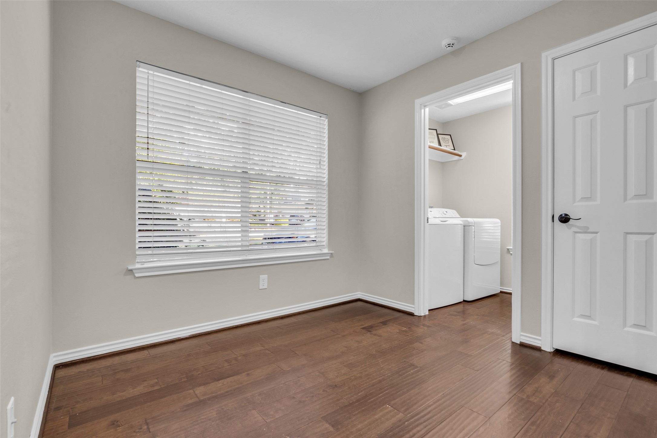 Laundry Room located off the breakfast nook, the closed door is a pantry