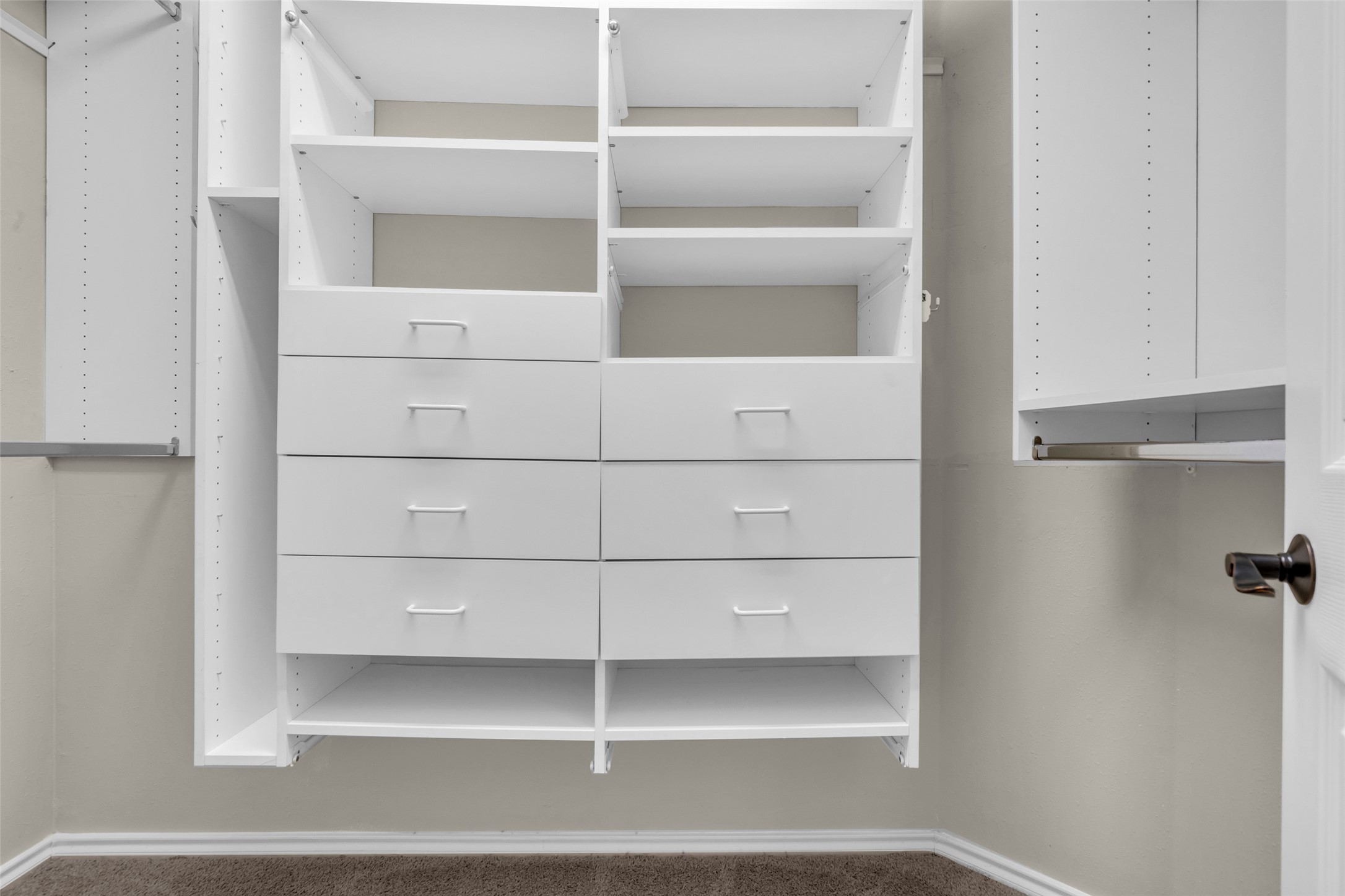 Primary suite custom closet.  Its larger than shown here.