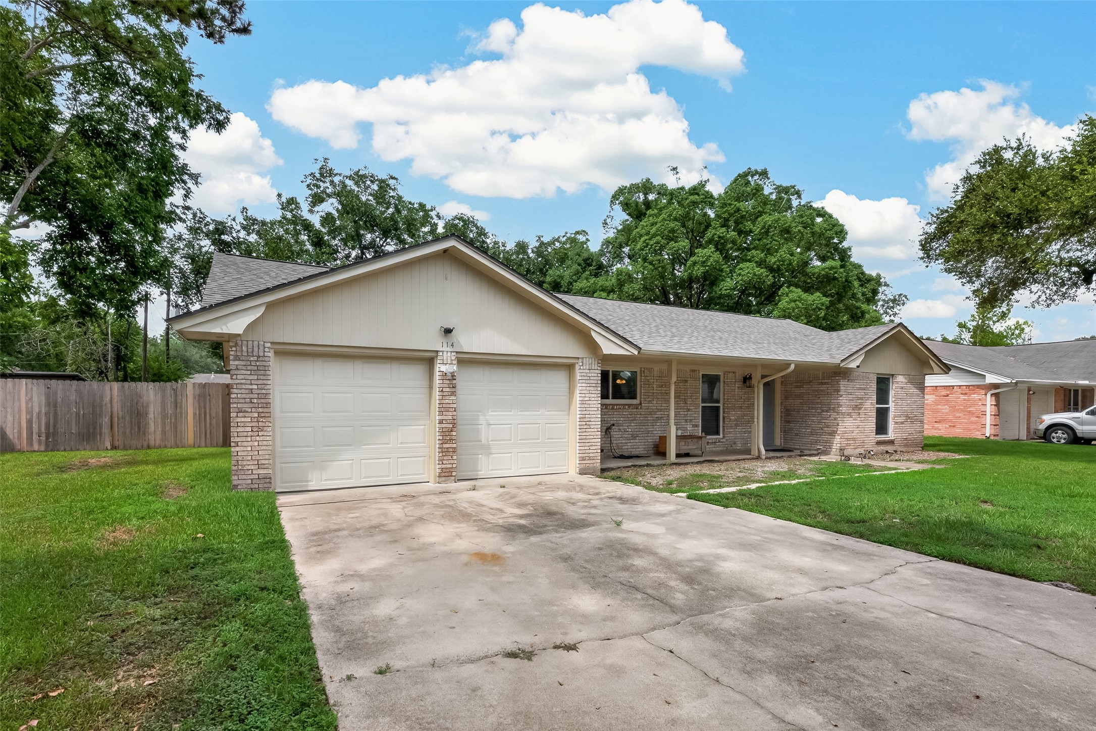 Plenty of front yard but wait til you see the back!