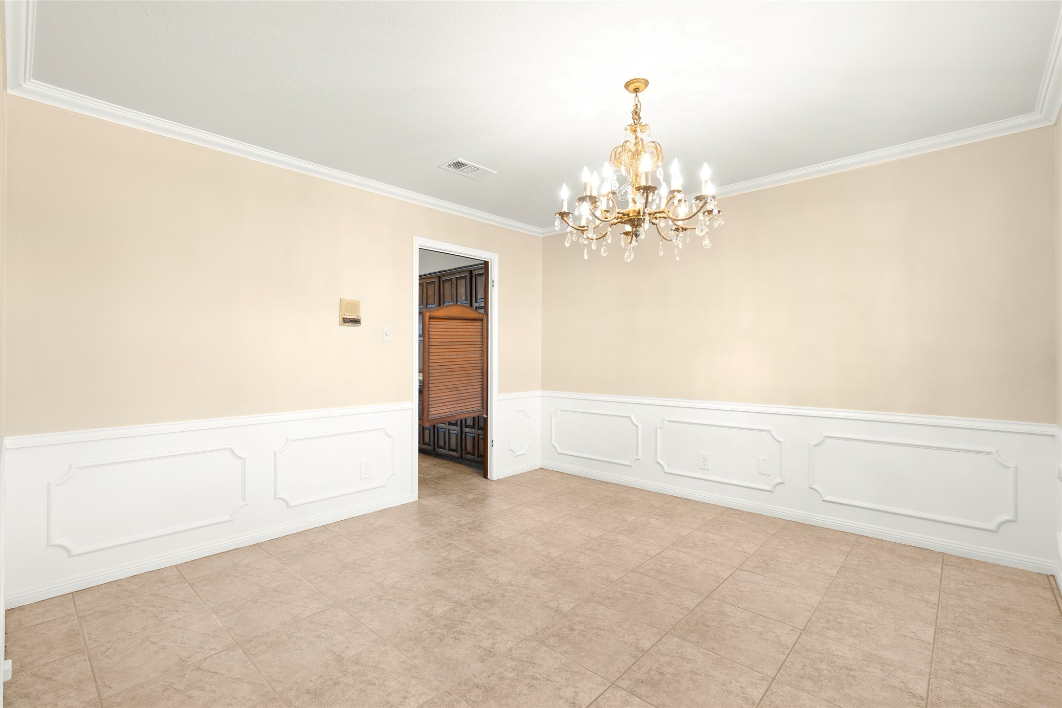 The dining room is located to the right of the entry way.