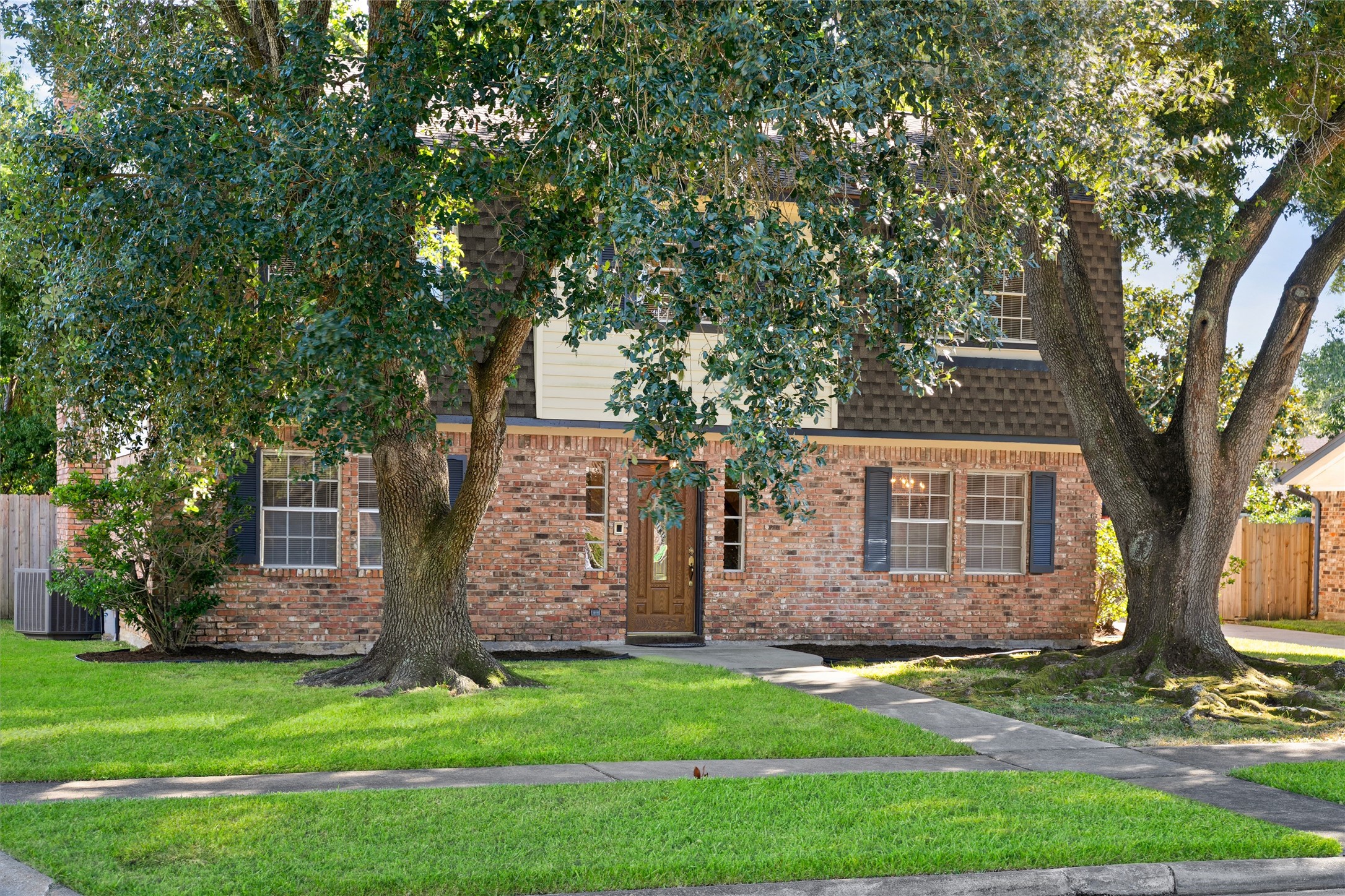 Here's another view of the oak trees you'll enjoy when you make this home your own.