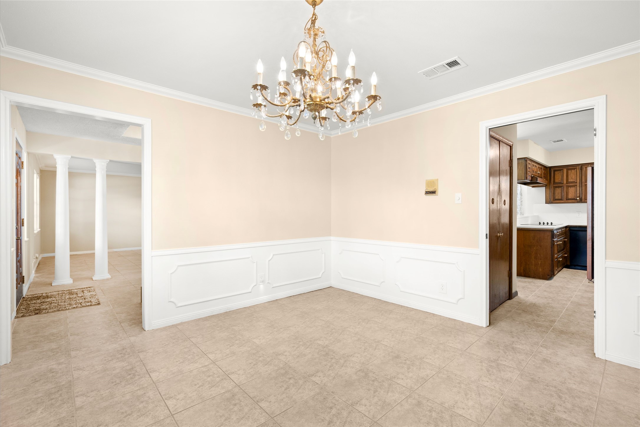 The kitchen is located just to the right off the dinng room.